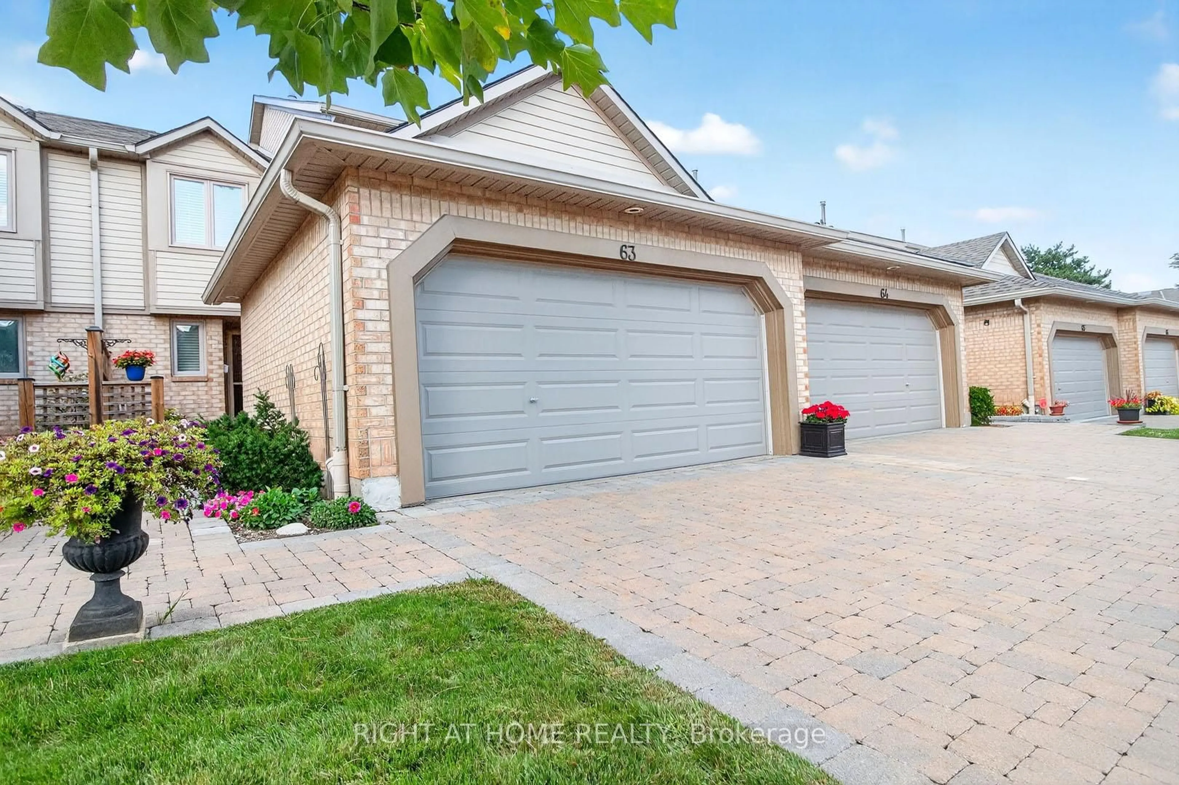 Home with brick exterior material, street for 1725 The Chase #63, Mississauga Ontario L5M 4N3