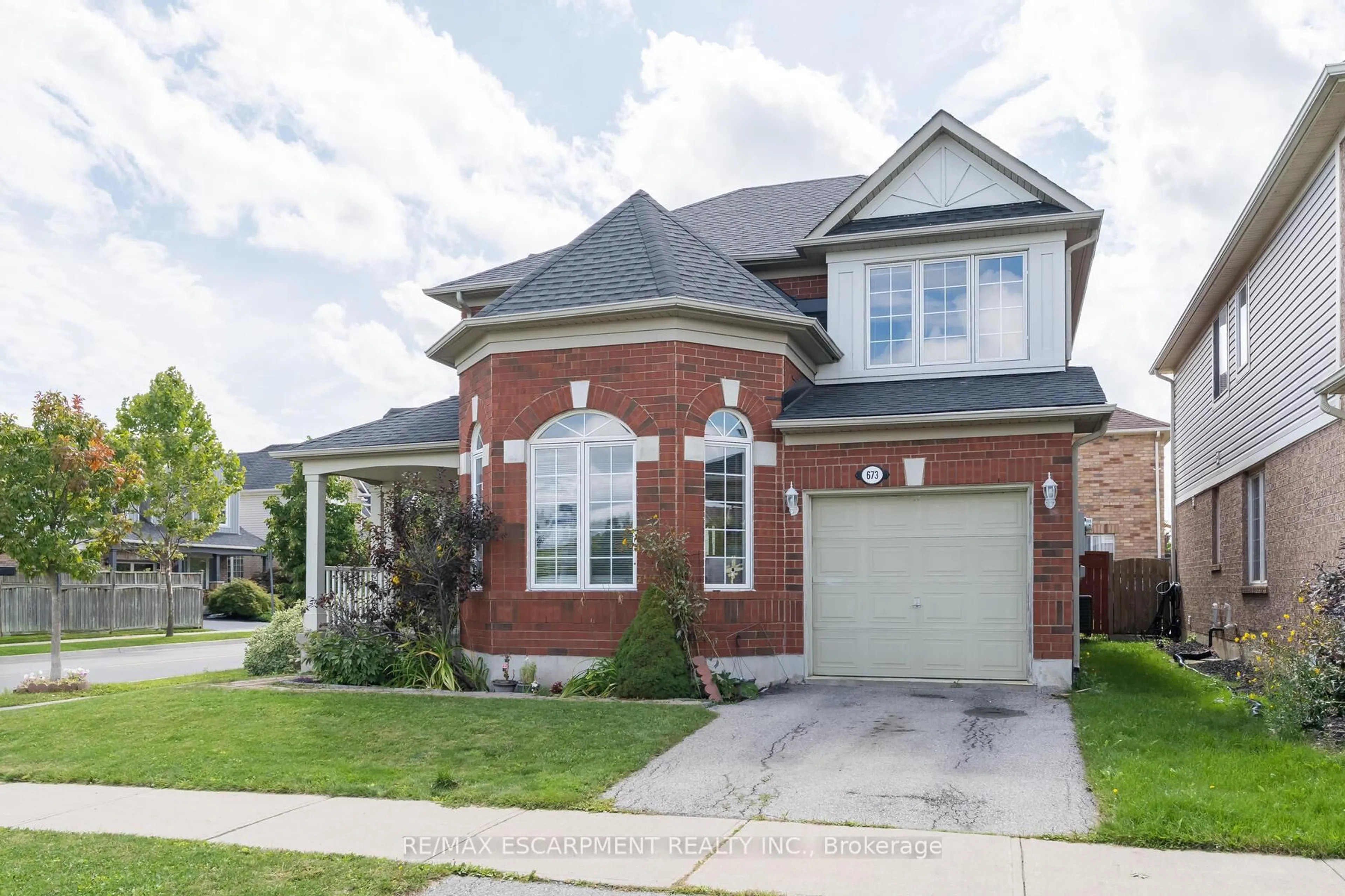 Home with brick exterior material, street for 673 Bennett Blvd, Milton Ontario L9T 6A8