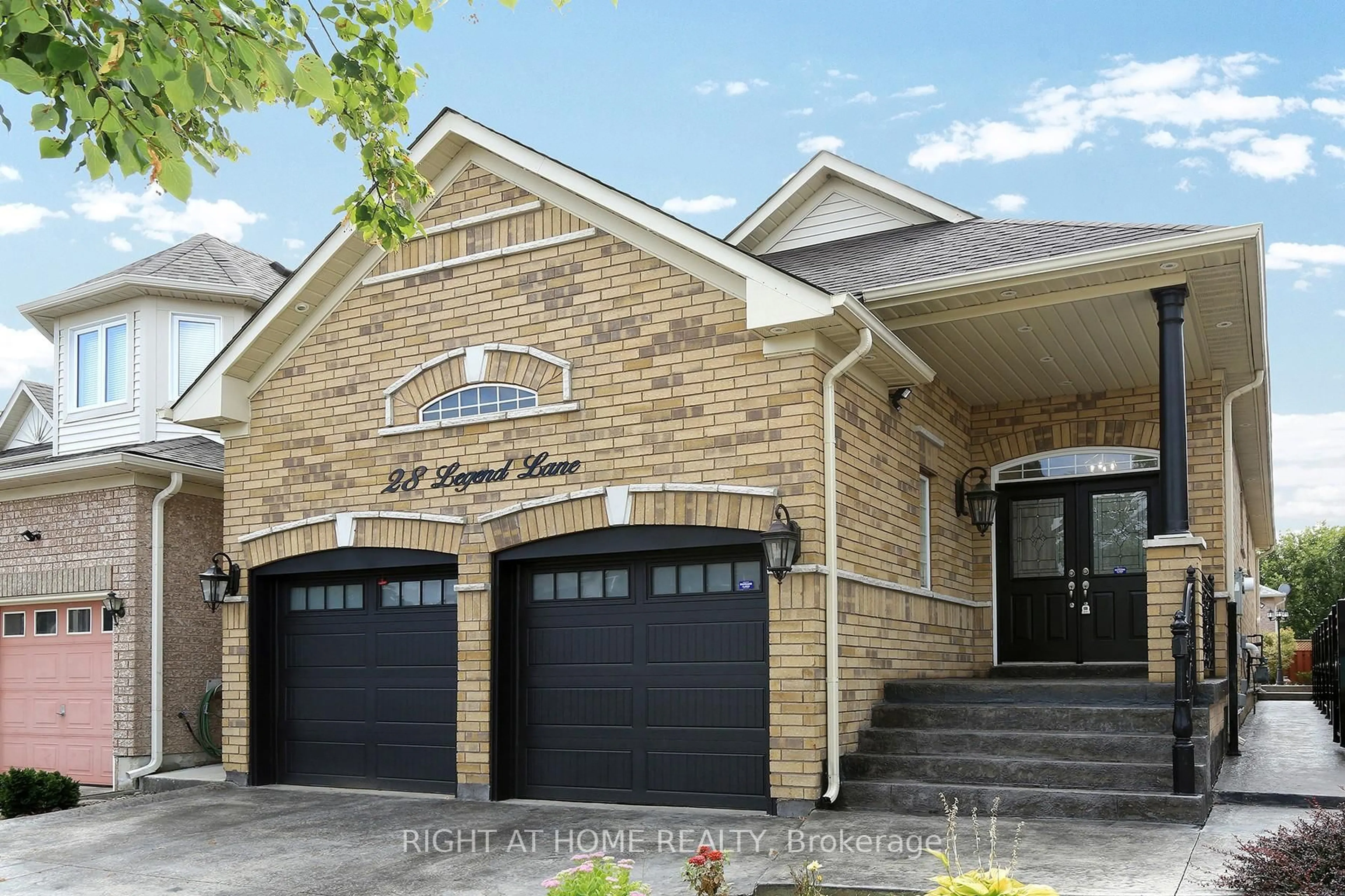 Home with brick exterior material, street for 28 Legend Lane, Brampton Ontario L6X 5B5