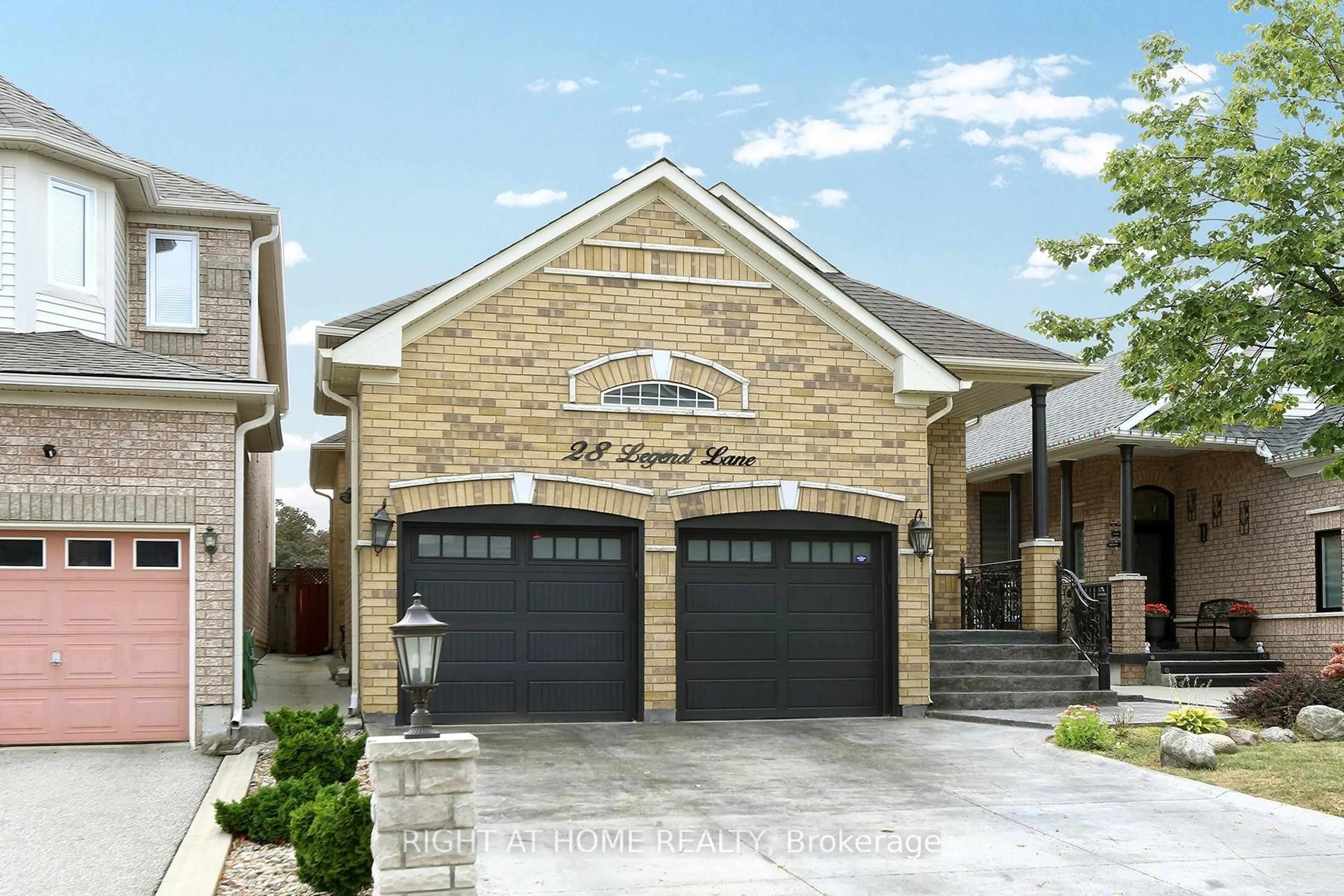 Home with brick exterior material, street for 28 Legend Lane, Brampton Ontario L6X 5B5
