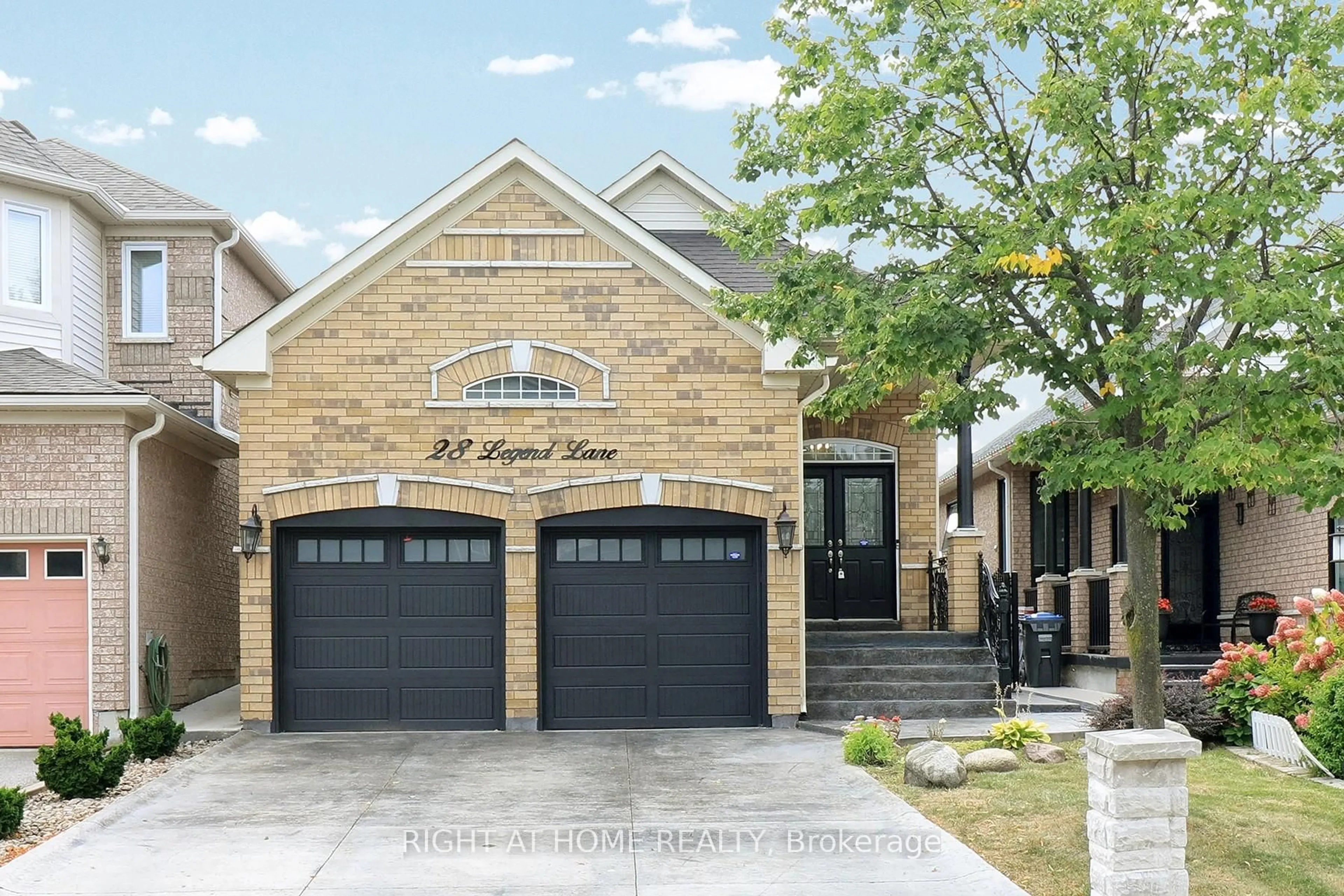 Home with brick exterior material, street for 28 Legend Lane, Brampton Ontario L6X 5B5