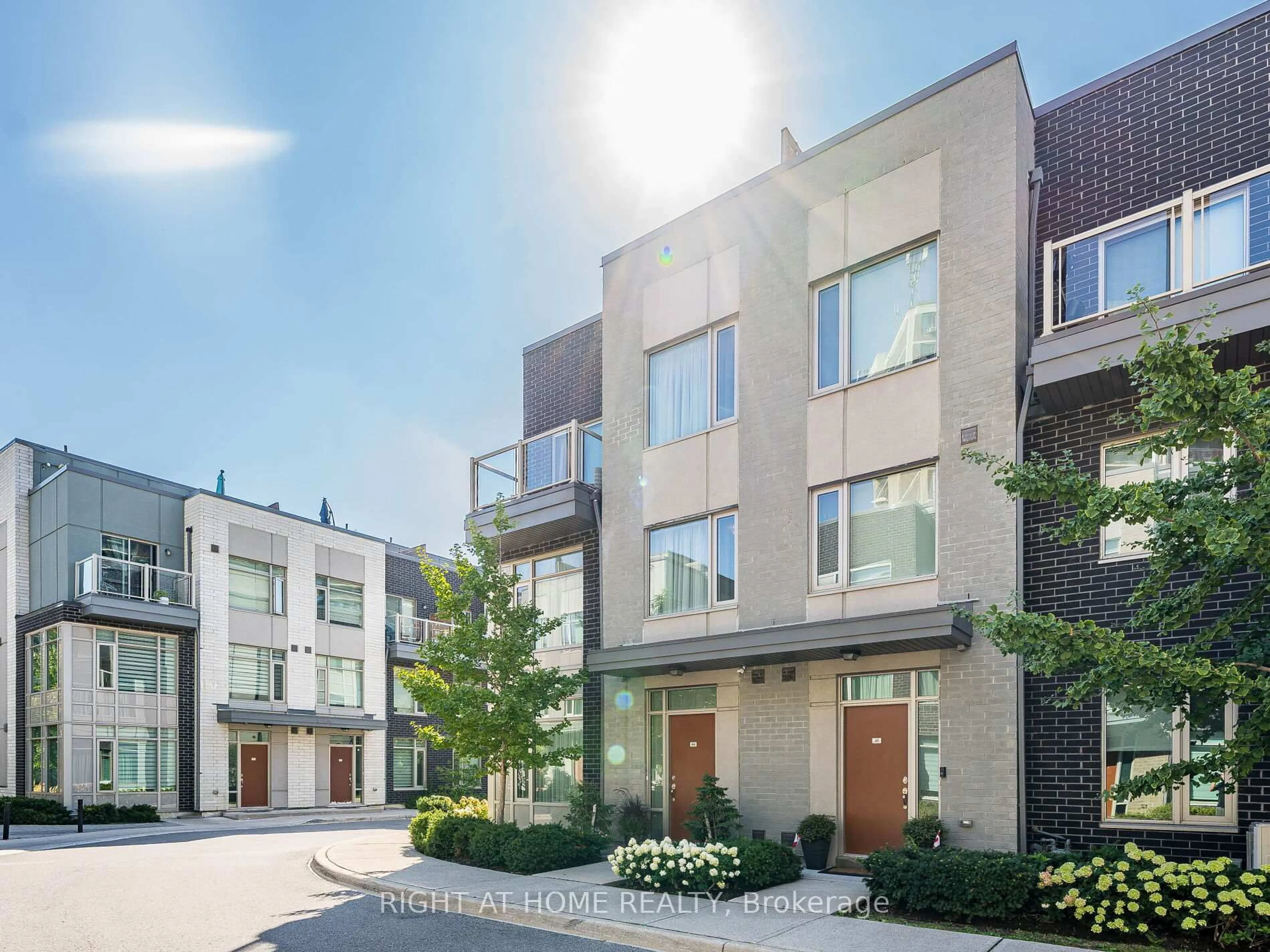 Home with brick exterior material, street for 26 APPLEWOOD Lane #44, Toronto Ontario M9C 0C1