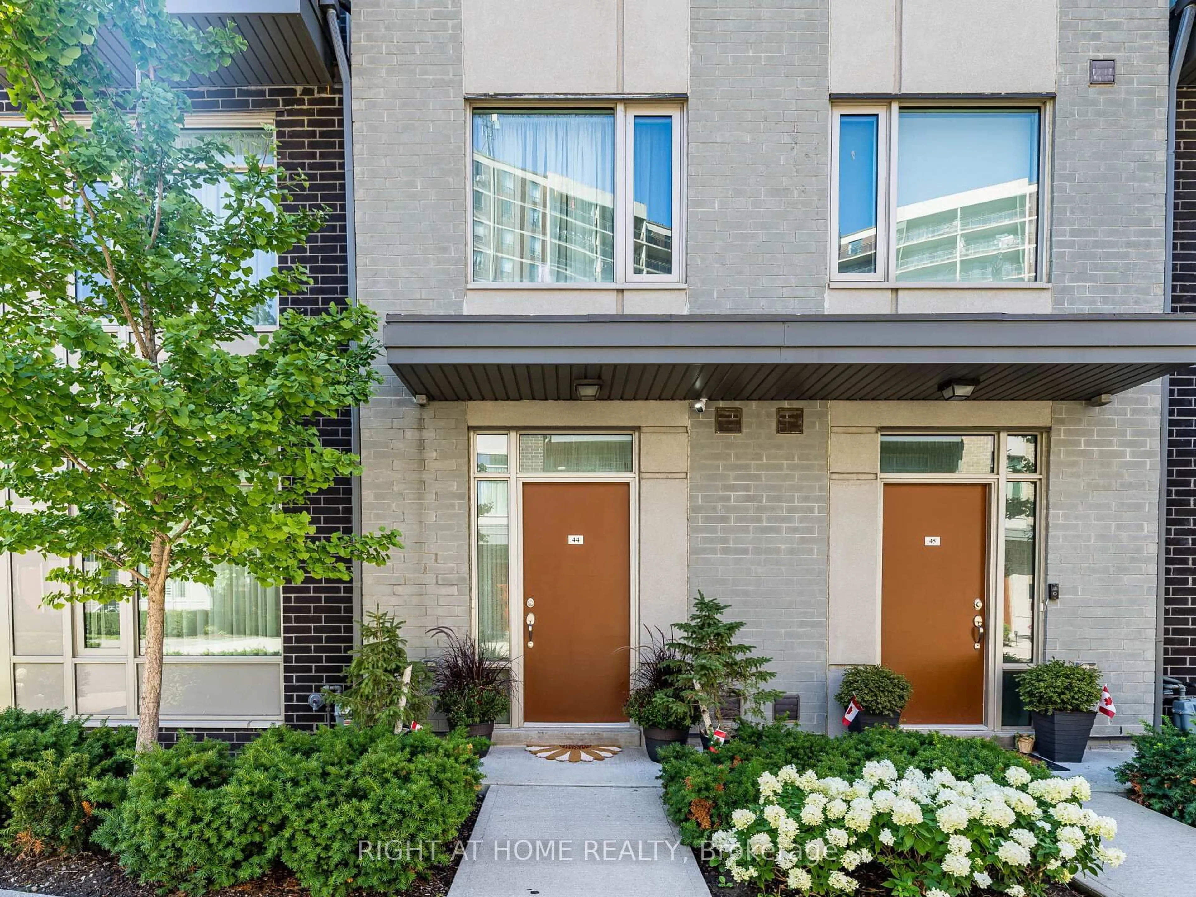 Home with brick exterior material, street for 26 APPLEWOOD Lane #44, Toronto Ontario M9C 0C1