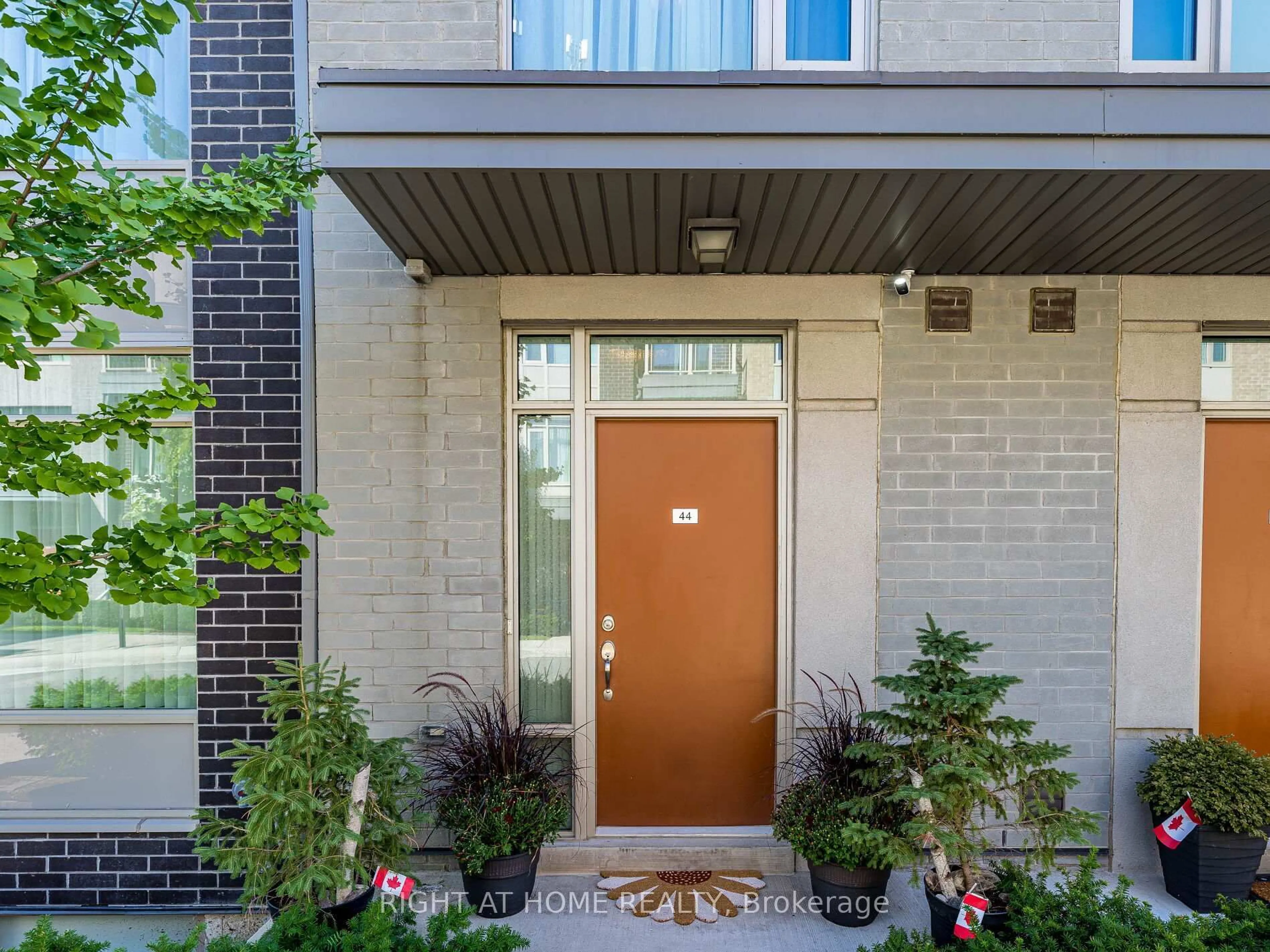 Home with brick exterior material, street for 26 APPLEWOOD Lane #44, Toronto Ontario M9C 0C1