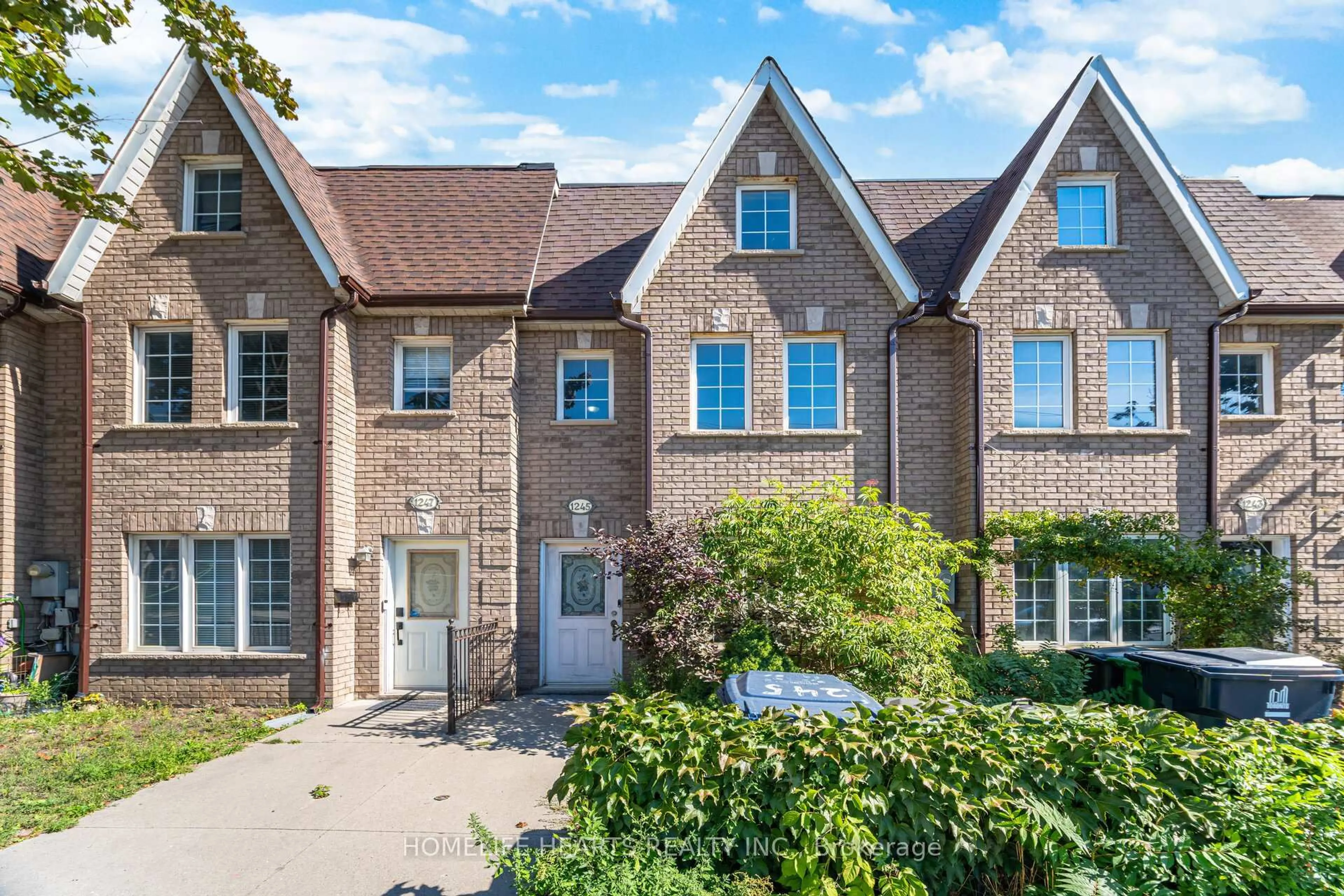 Home with brick exterior material, street for 1245 Weston Rd, Toronto Ontario M6M 4P9
