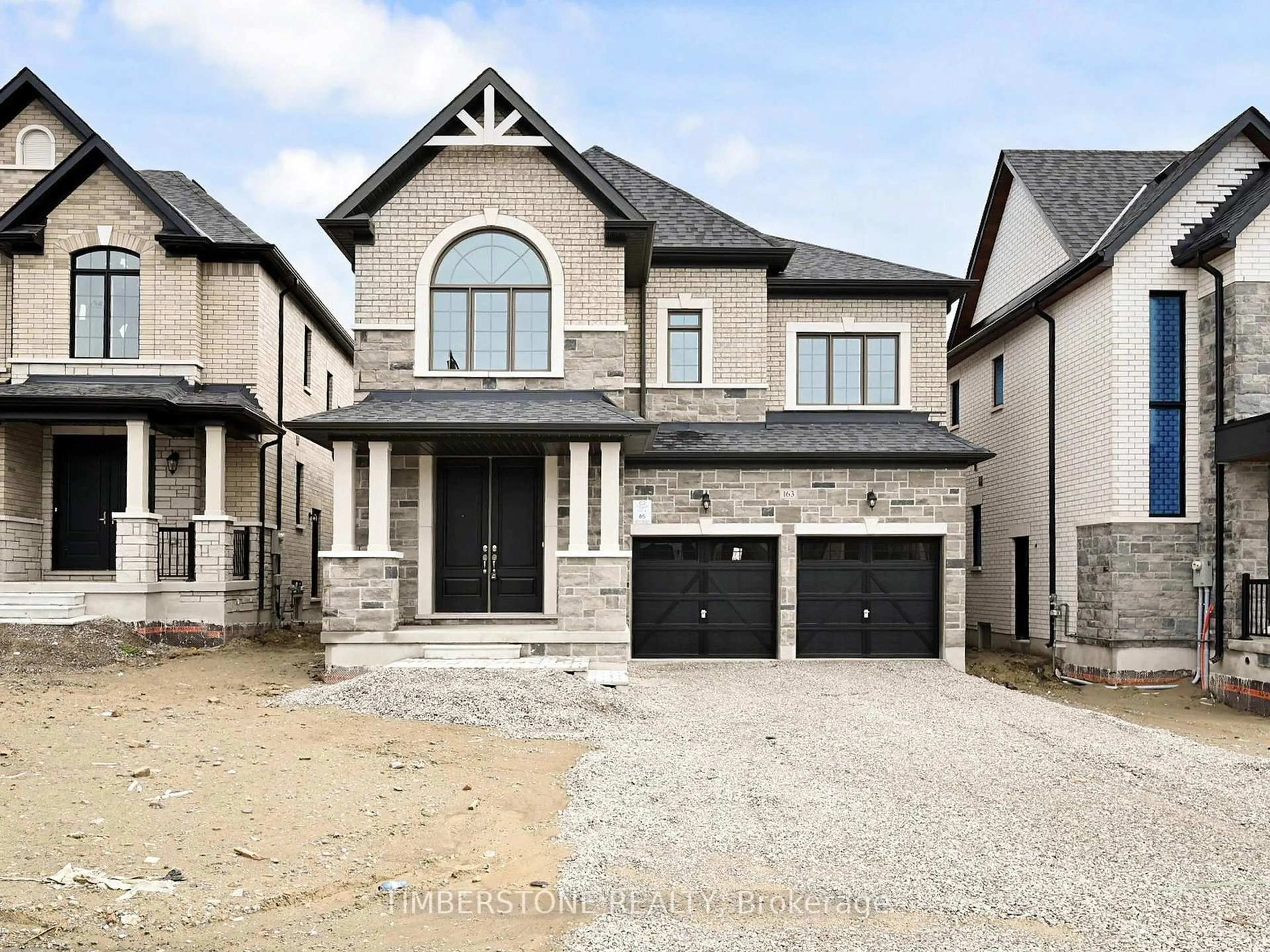 Home with brick exterior material, street for 163 Thorndale Rd, Brampton Ontario L6P 4R8