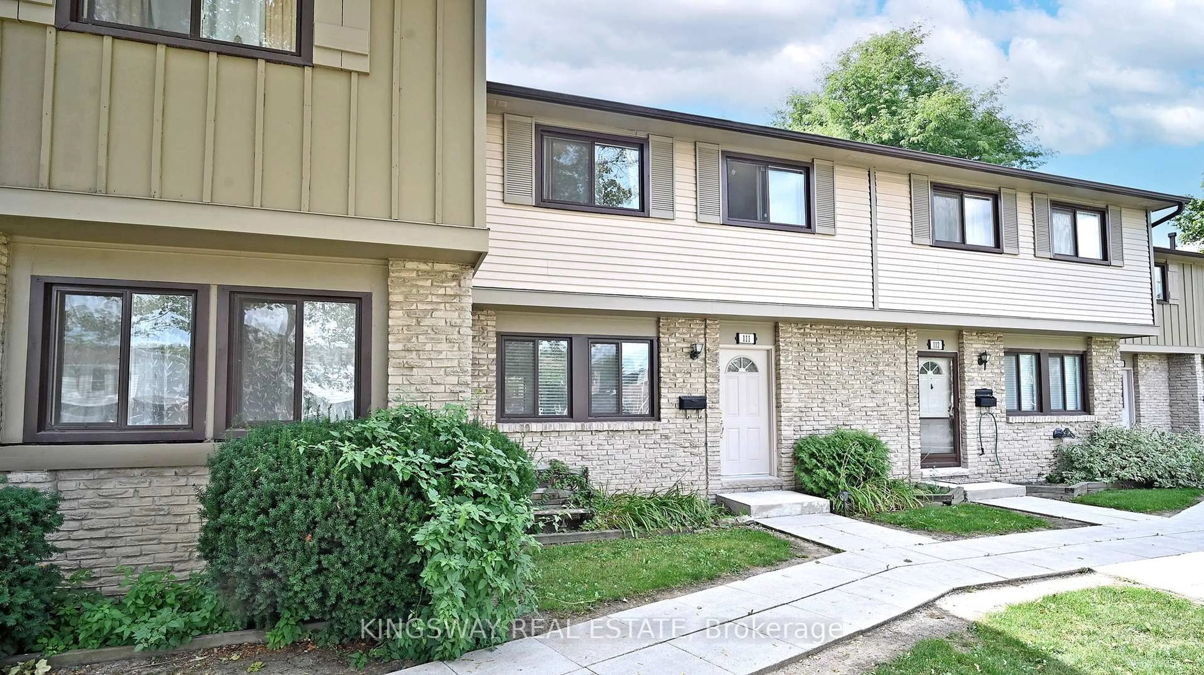 Home with brick exterior material, street for 105 Hansen Rd #111, Brampton Ontario L6V 3C9