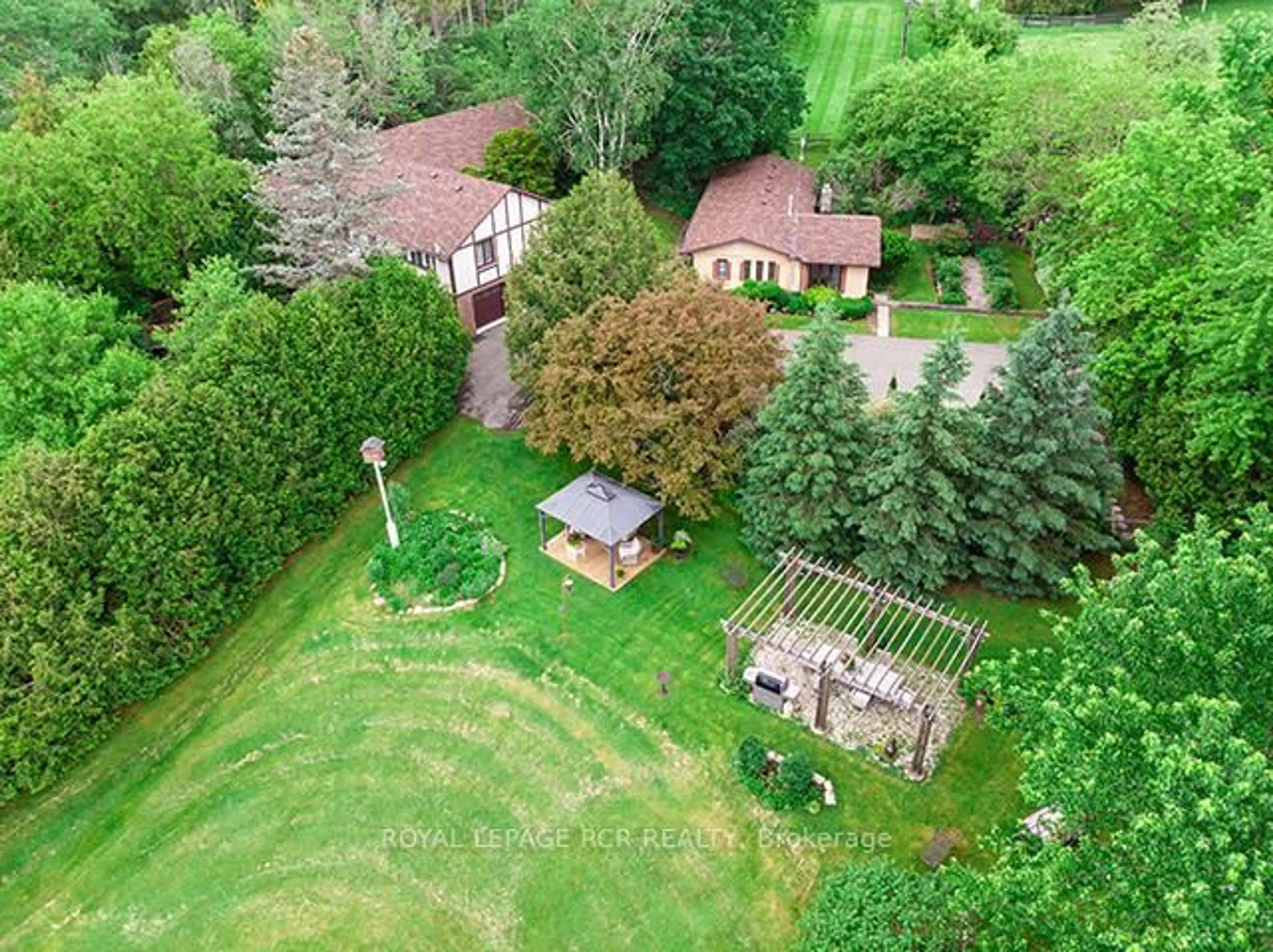 A pic from outside/outdoor area/front of a property/back of a property/a pic from drone, forest/trees view for 14902 Mount Pleasant Rd, Caledon Ontario L7E 3M3