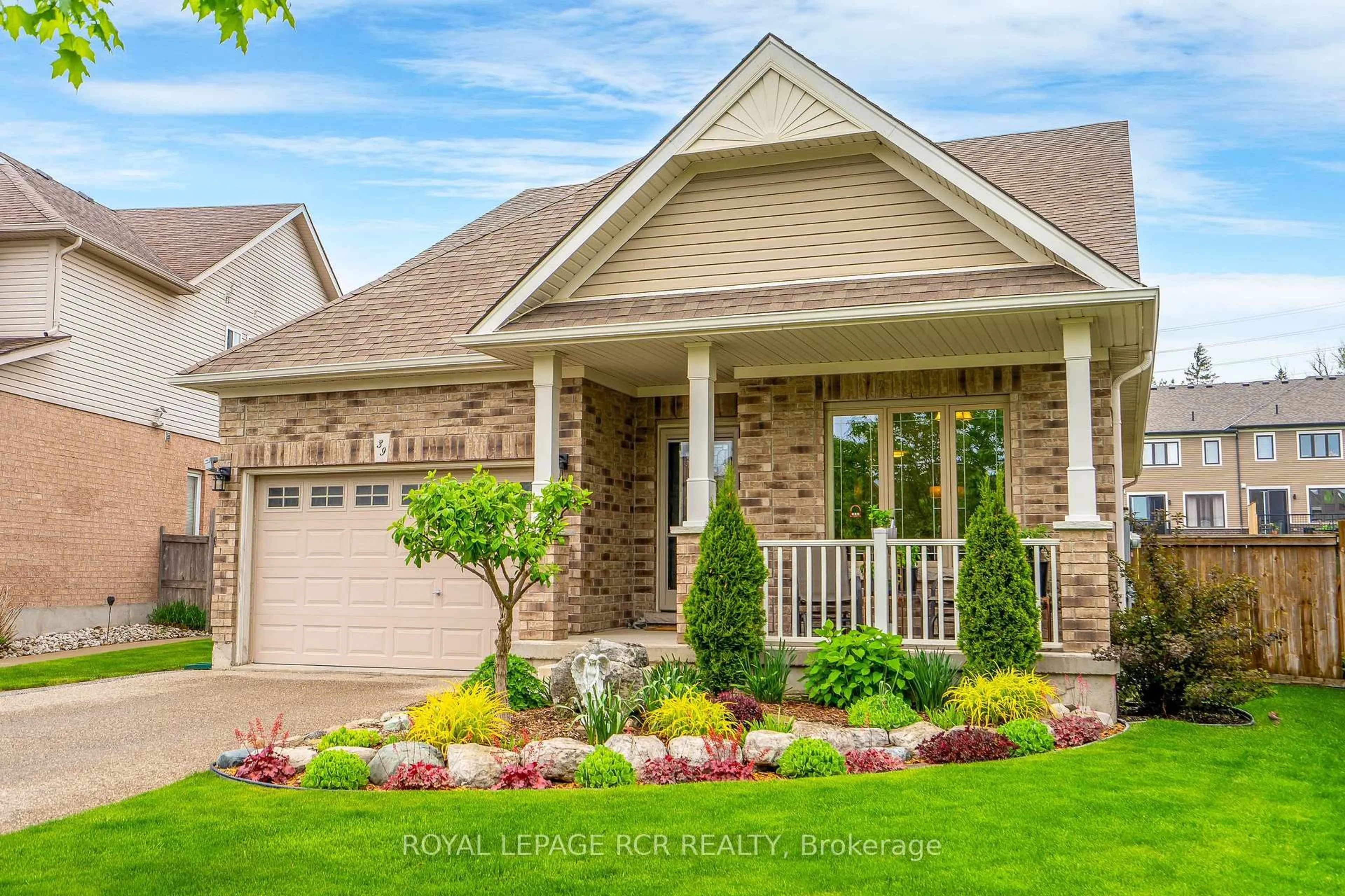 Home with brick exterior material, street for 39 Dinnick Cres, Orangeville Ontario L9W 0B7