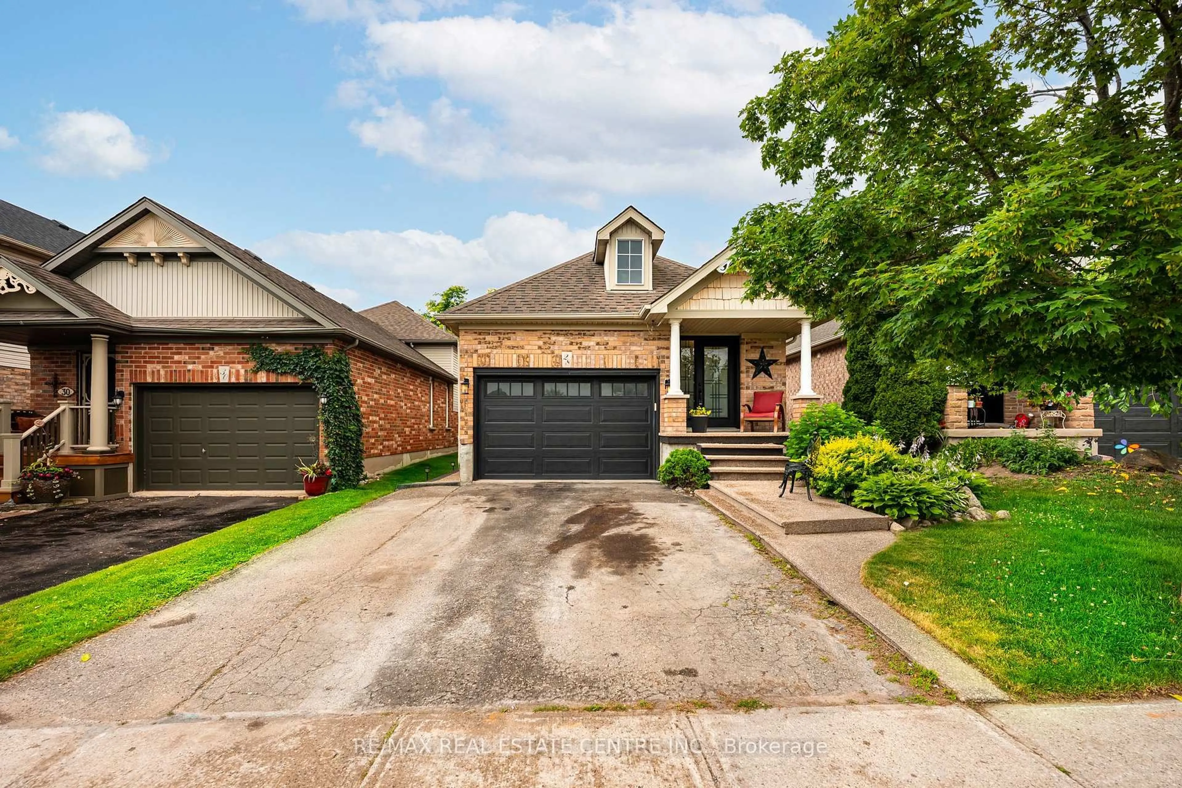 Home with brick exterior material, street for 28 Henderson St, Orangeville Ontario L9W 5G1