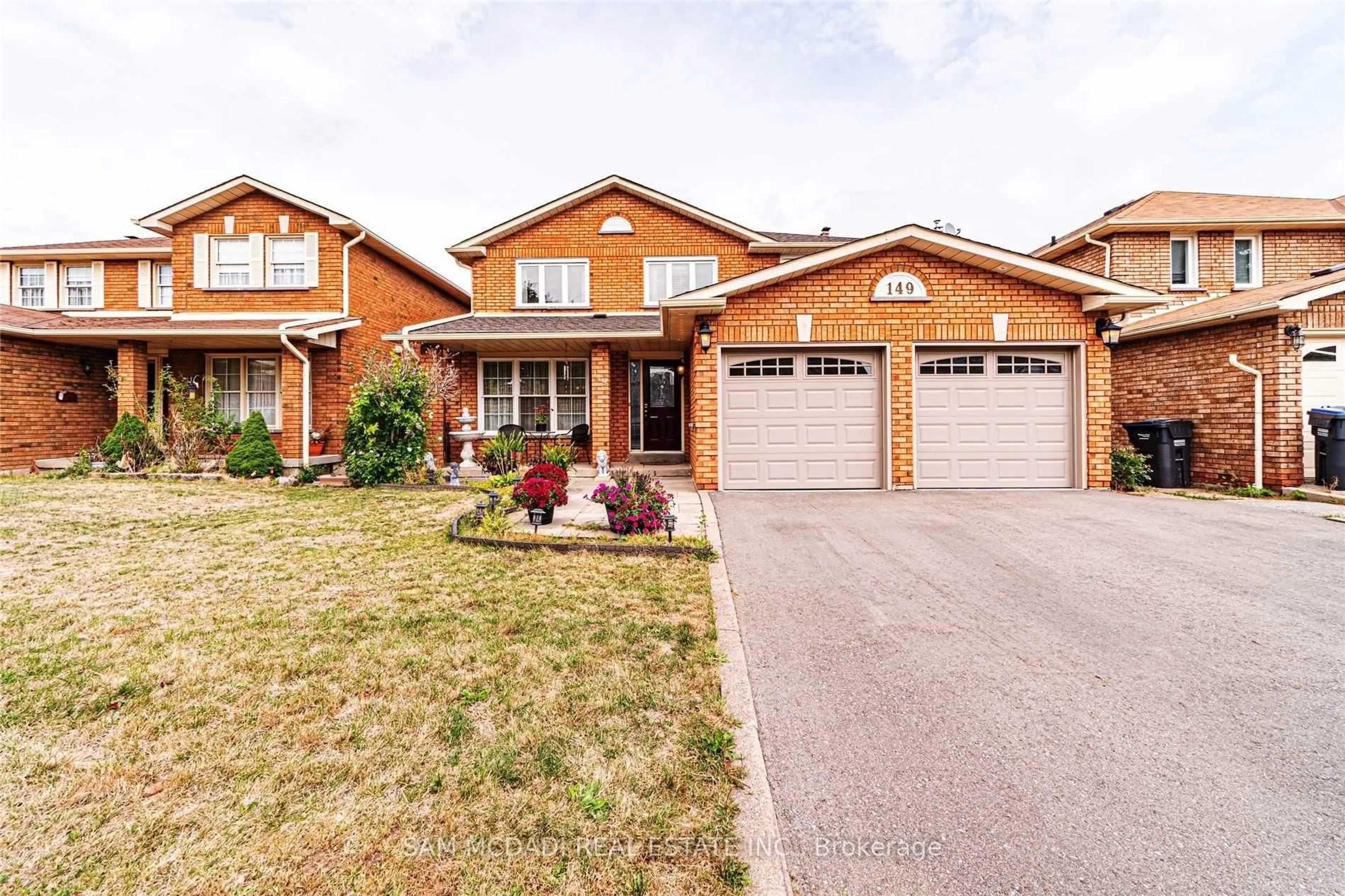 Home with brick exterior material, street for 149 Sunforest Dr, Brampton Ontario L6Z 4B7