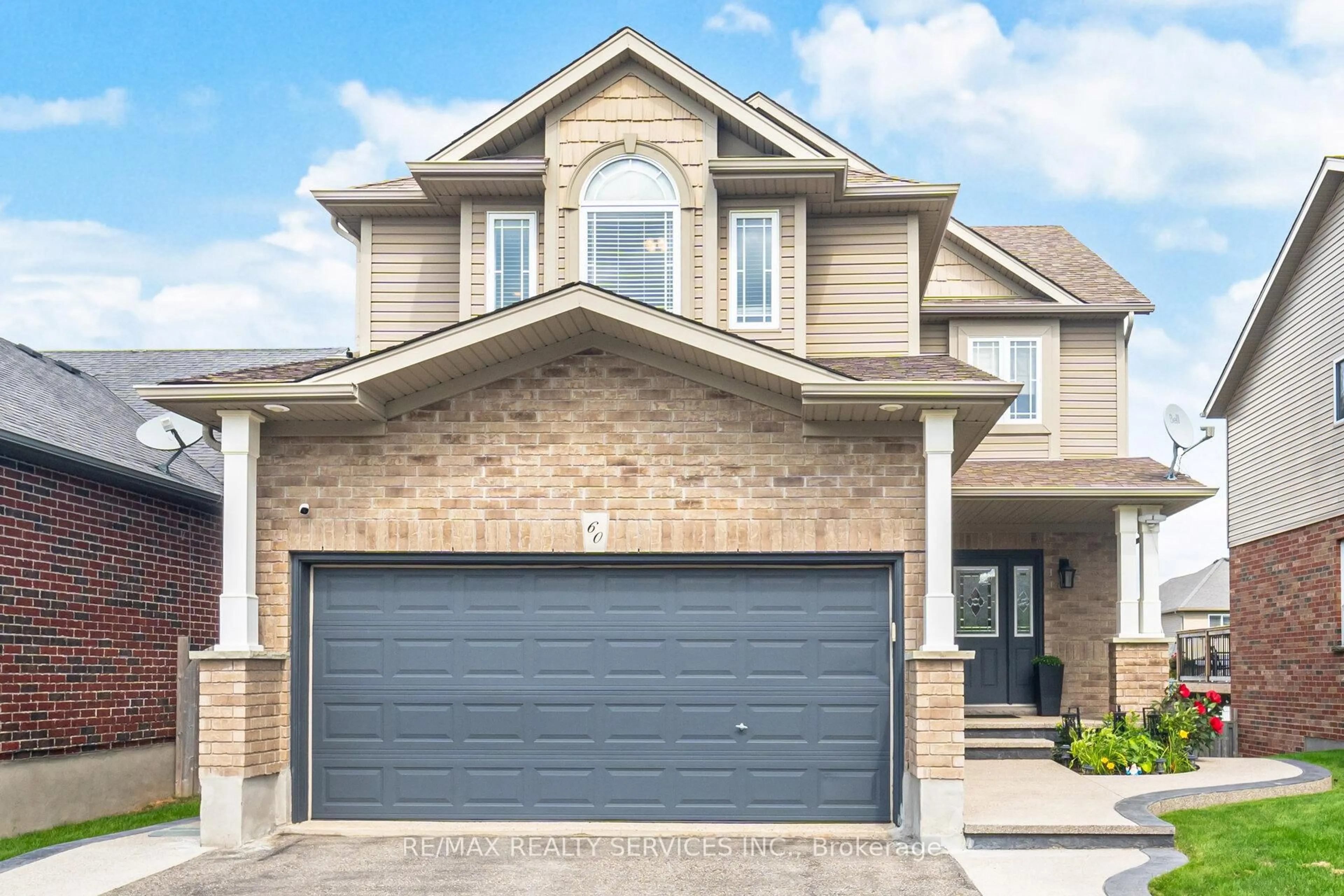 Home with brick exterior material, street for 60 Dinnick Cres, Orangeville Ontario L9W 0B7