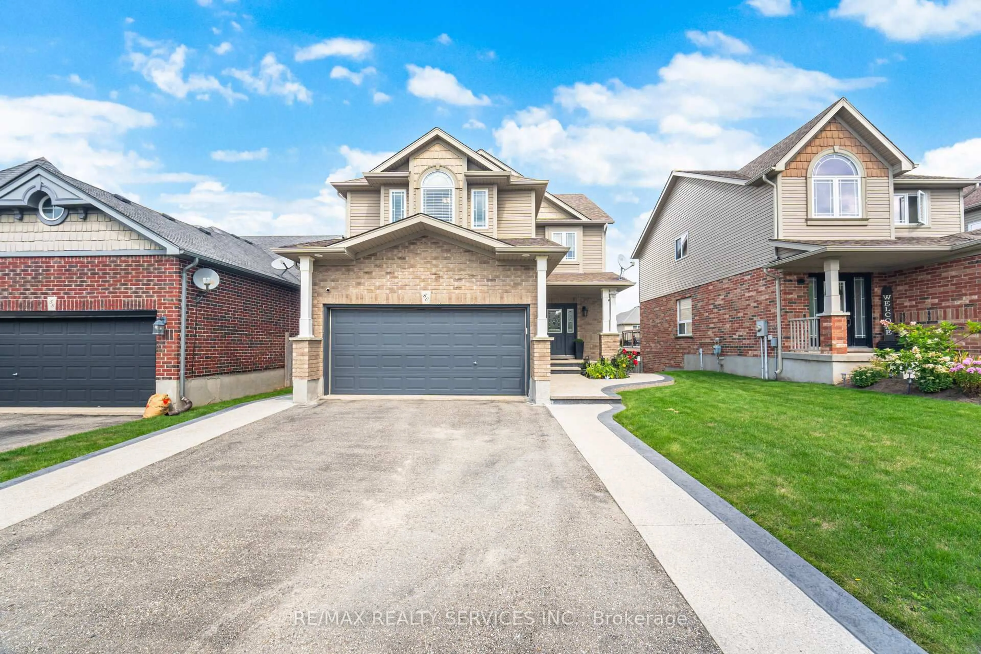 Home with brick exterior material, street for 60 Dinnick Cres, Orangeville Ontario L9W 0B7
