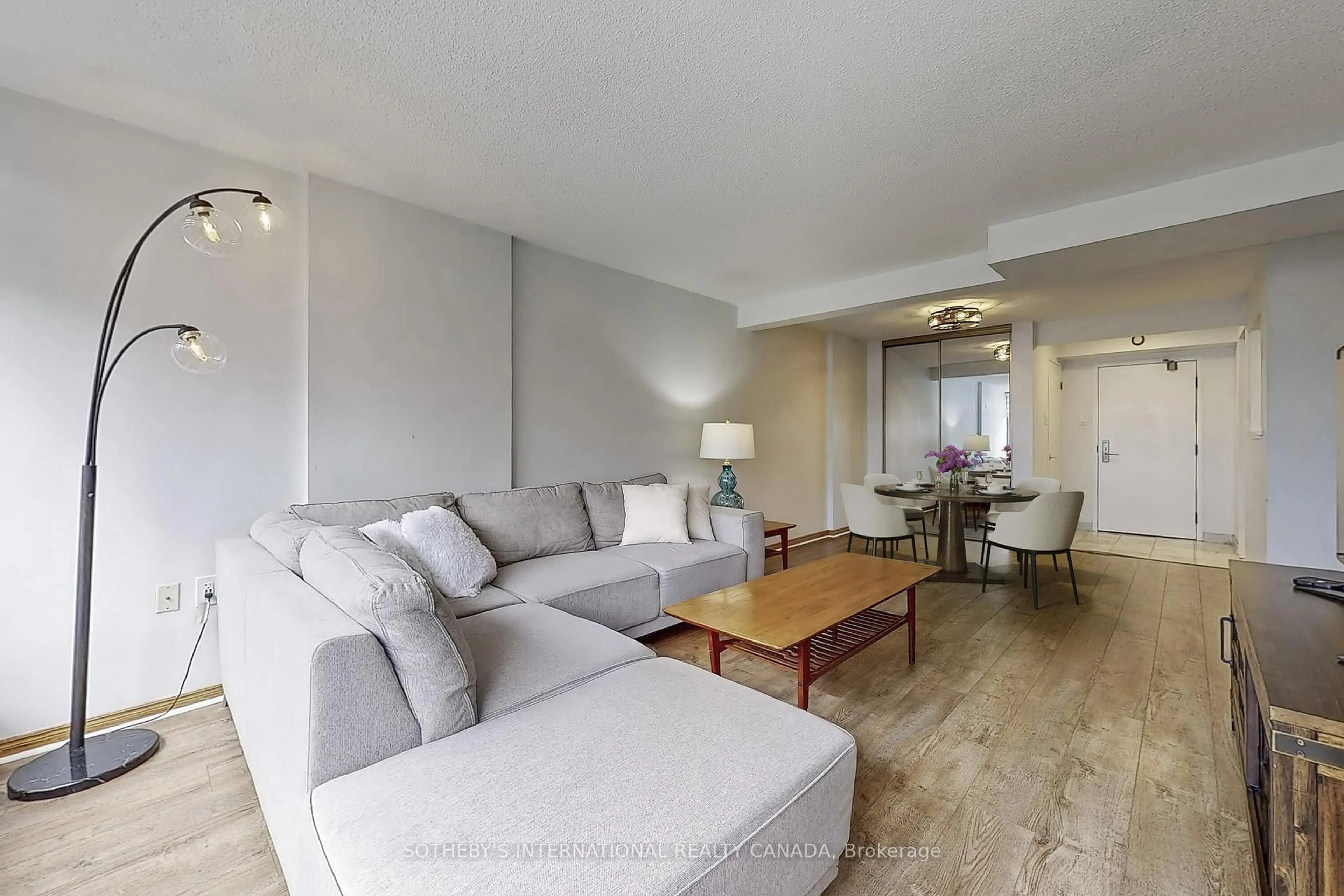 Living room with furniture, unknown for 25 Fairview Rd #406, Mississauga Ontario L5B 3Y8