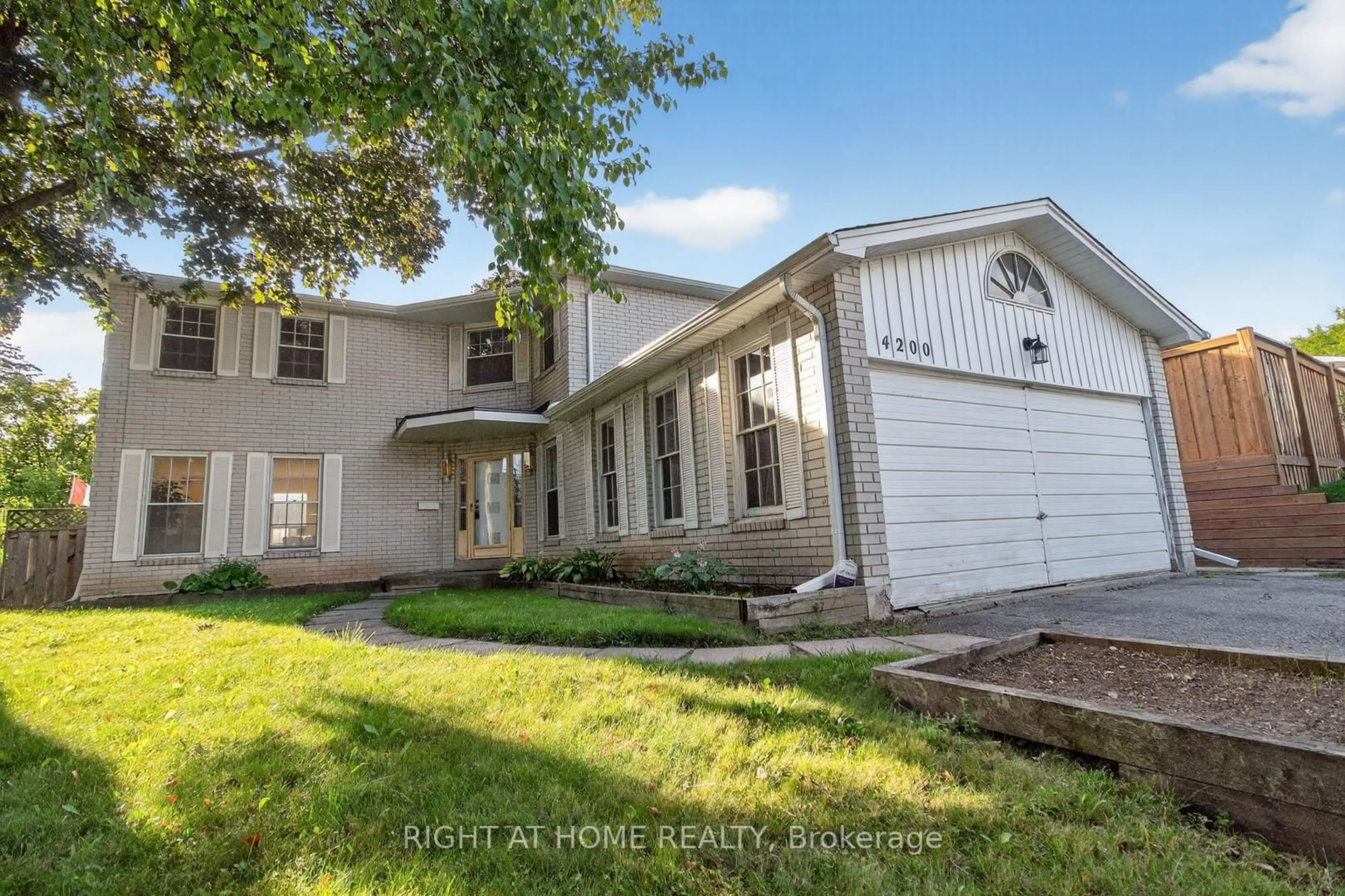 Home with vinyl exterior material, street for 4200 Garrowhill Tr, Mississauga Ontario L4W 2H4