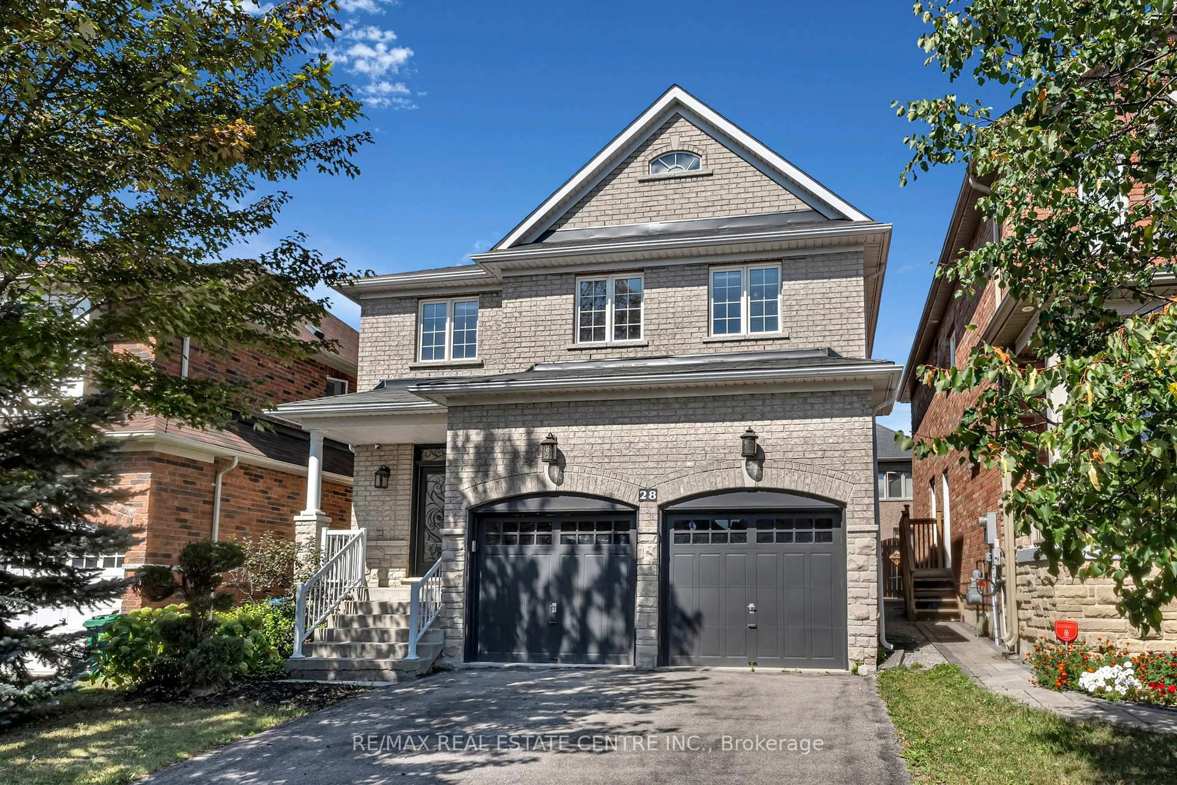 Home with brick exterior material, street for 28 Fallharvest Ave, Brampton Ontario L6Y 0P2