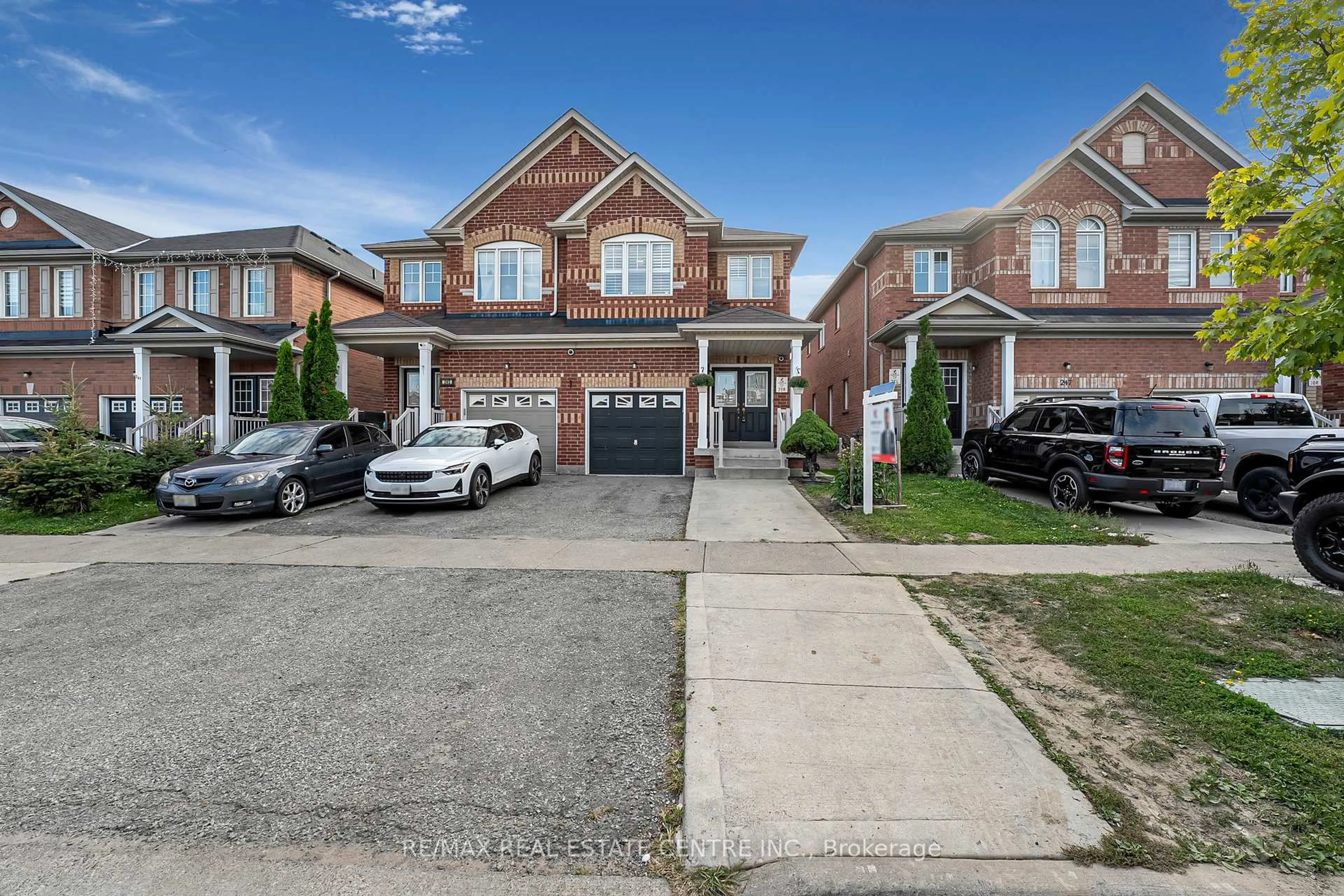 Home with brick exterior material, street for 245 Checkerberry Cres, Brampton Ontario L6R 3P7