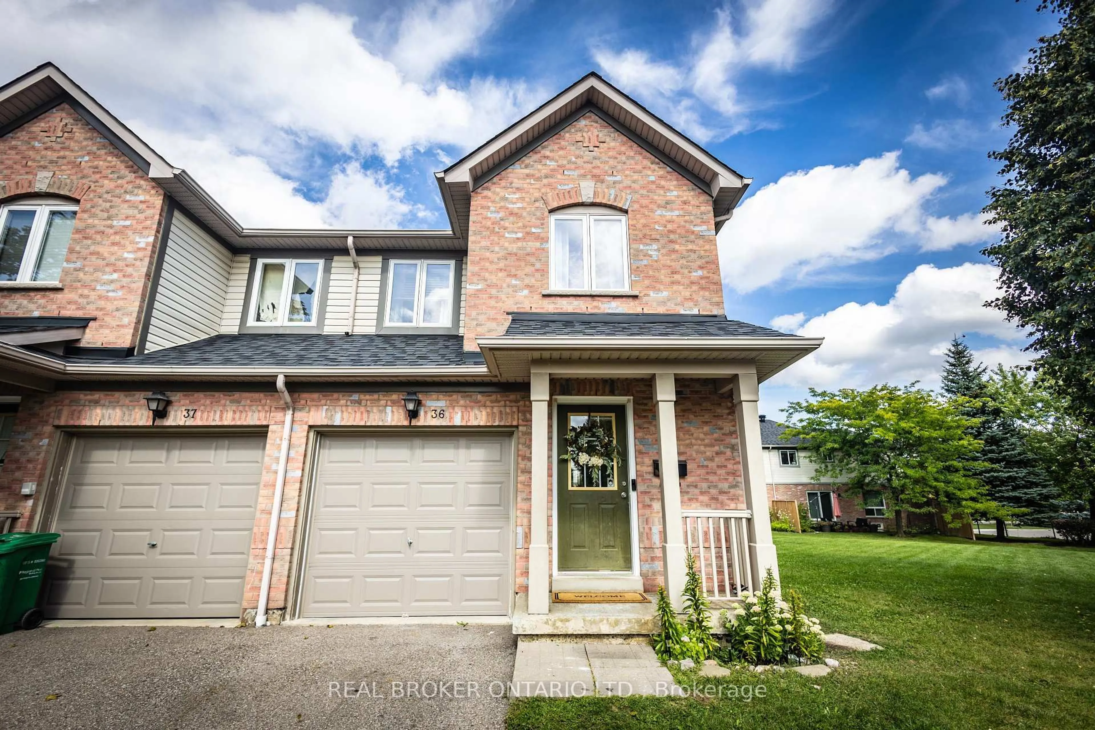 Home with brick exterior material, street for 5255 Guildwood Way #36, Mississauga Ontario L5R 4A7