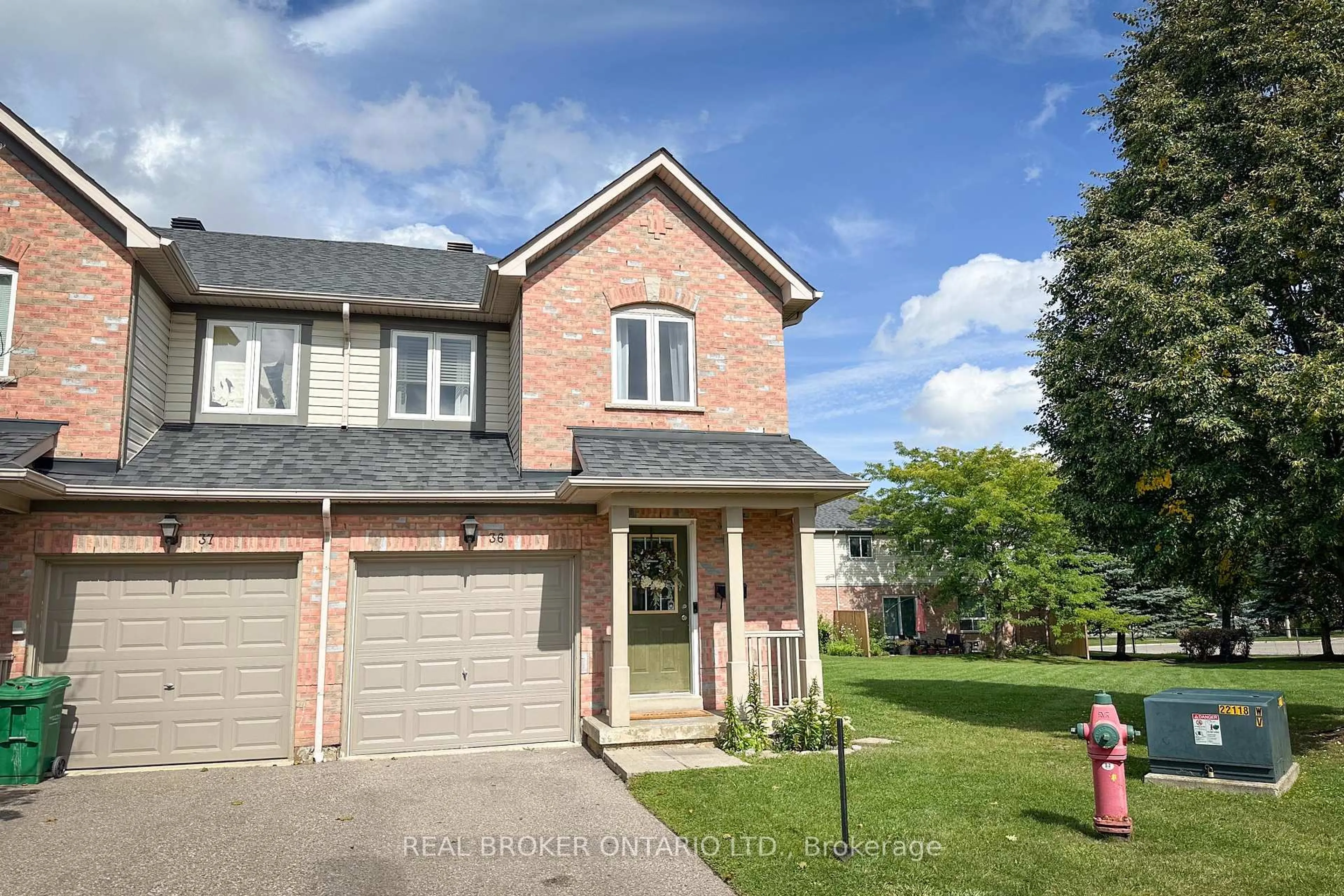 Home with brick exterior material, street for 5255 Guildwood Way #36, Mississauga Ontario L5R 4A7
