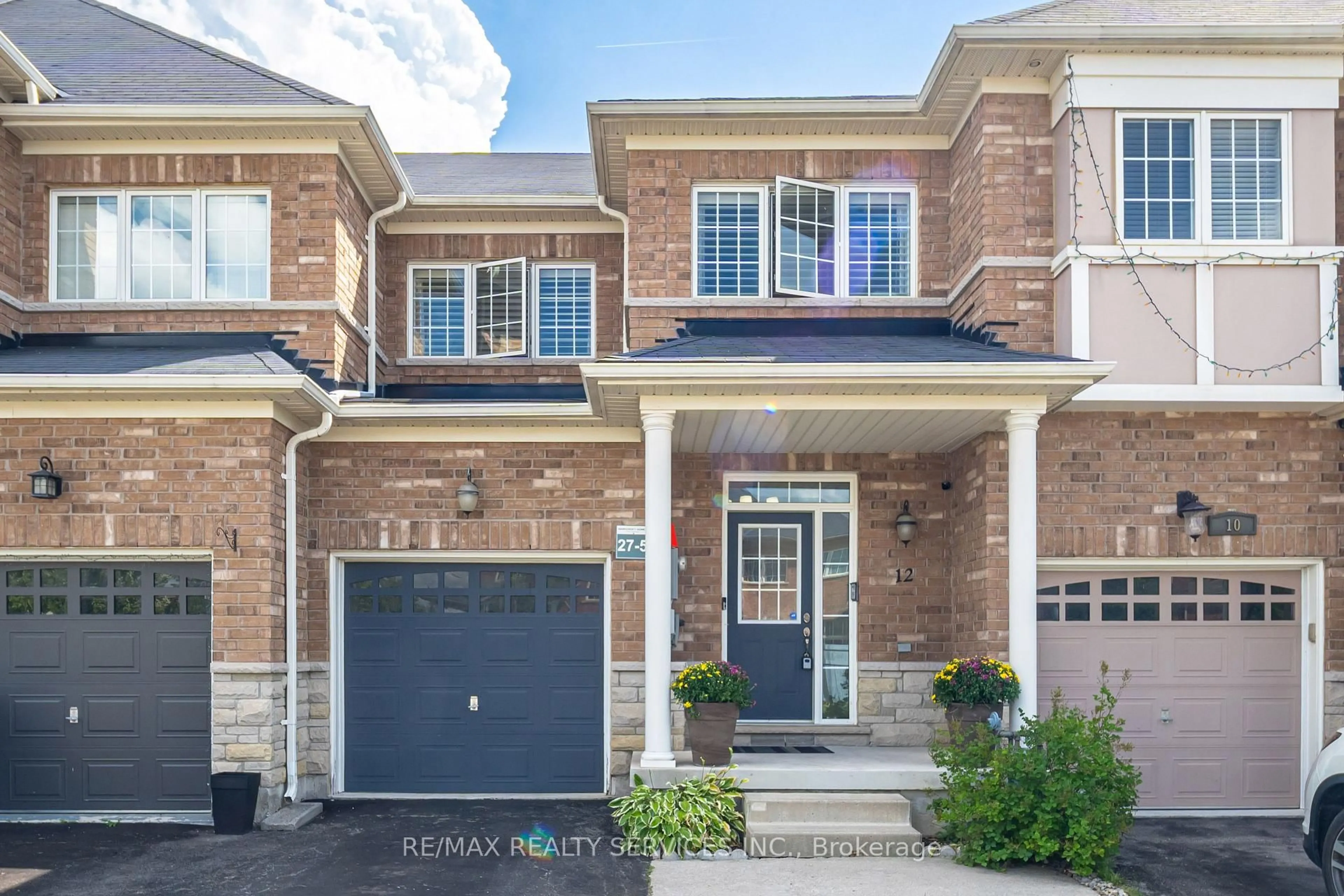Home with brick exterior material, street for 12 Seedland Cres, Brampton Ontario L6R 0Z6