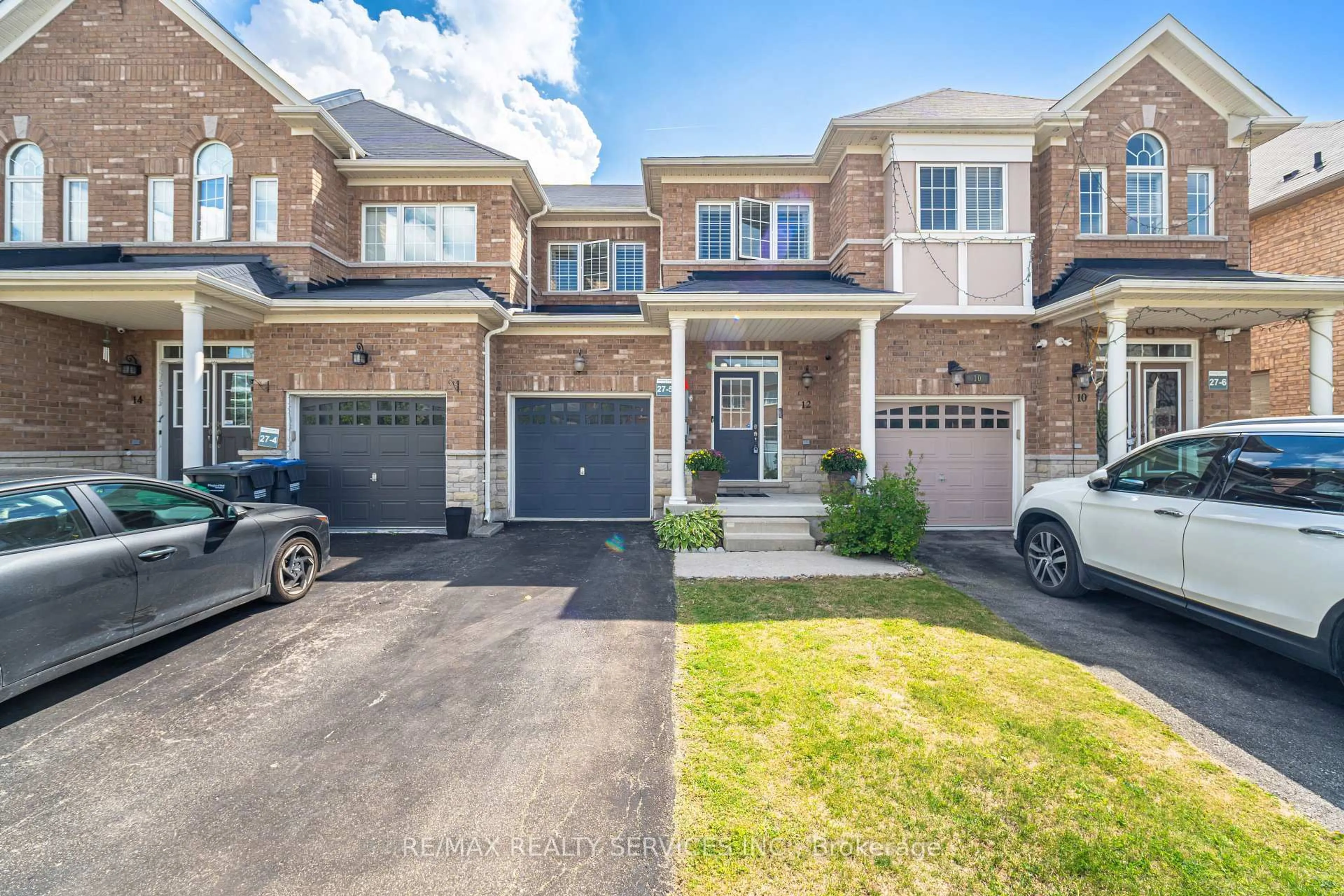 Home with brick exterior material, street for 12 Seedland Cres, Brampton Ontario L6R 0Z6