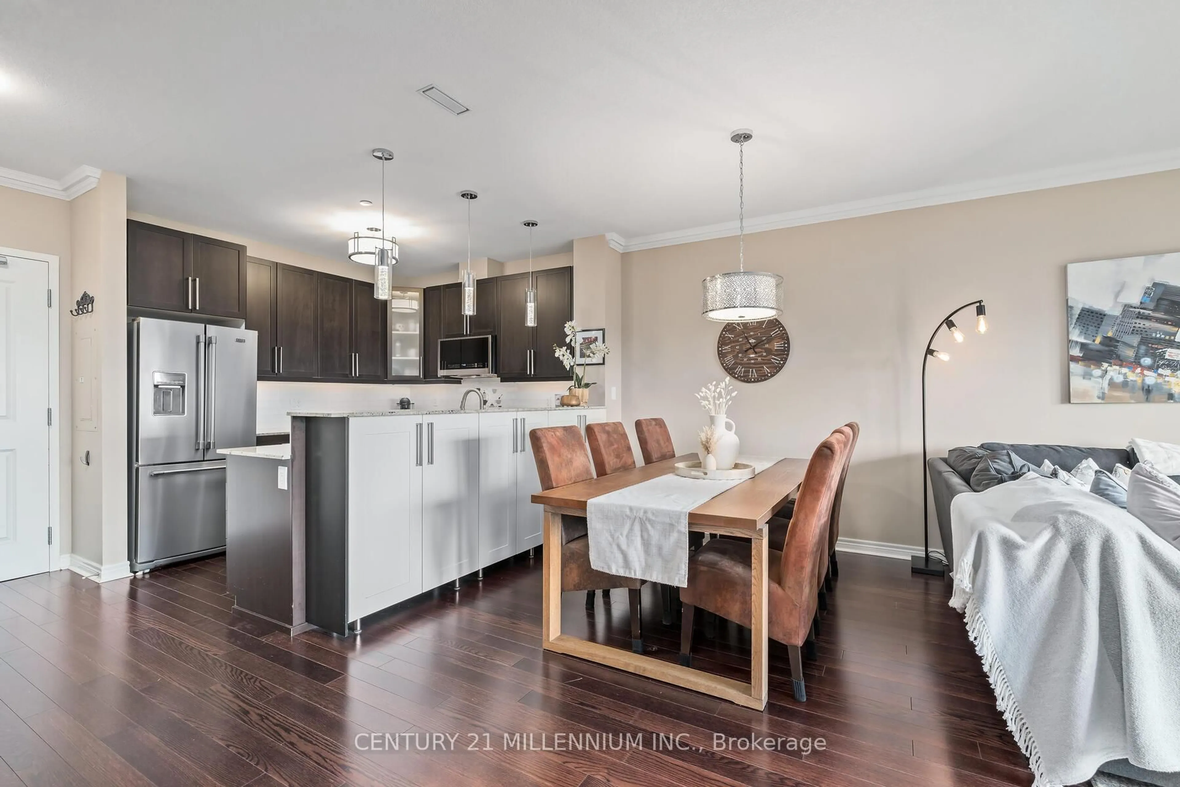 Open concept kitchen, wood/laminate floor for 33 Whitmer St #413, Milton Ontario L9T 8P9
