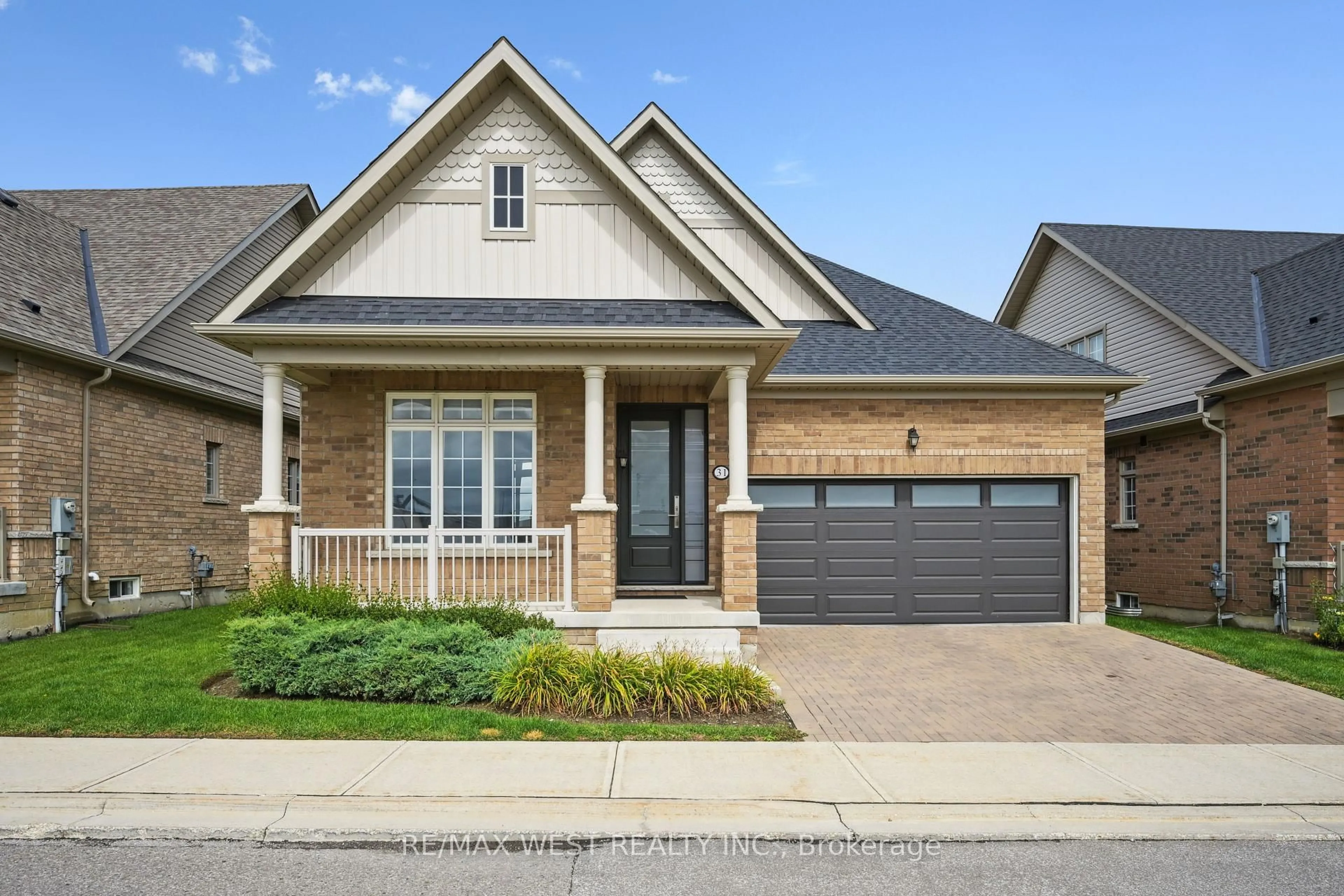 Home with brick exterior material, street for 31 Tea Rose Rd, Brampton Ontario L6R 0W2