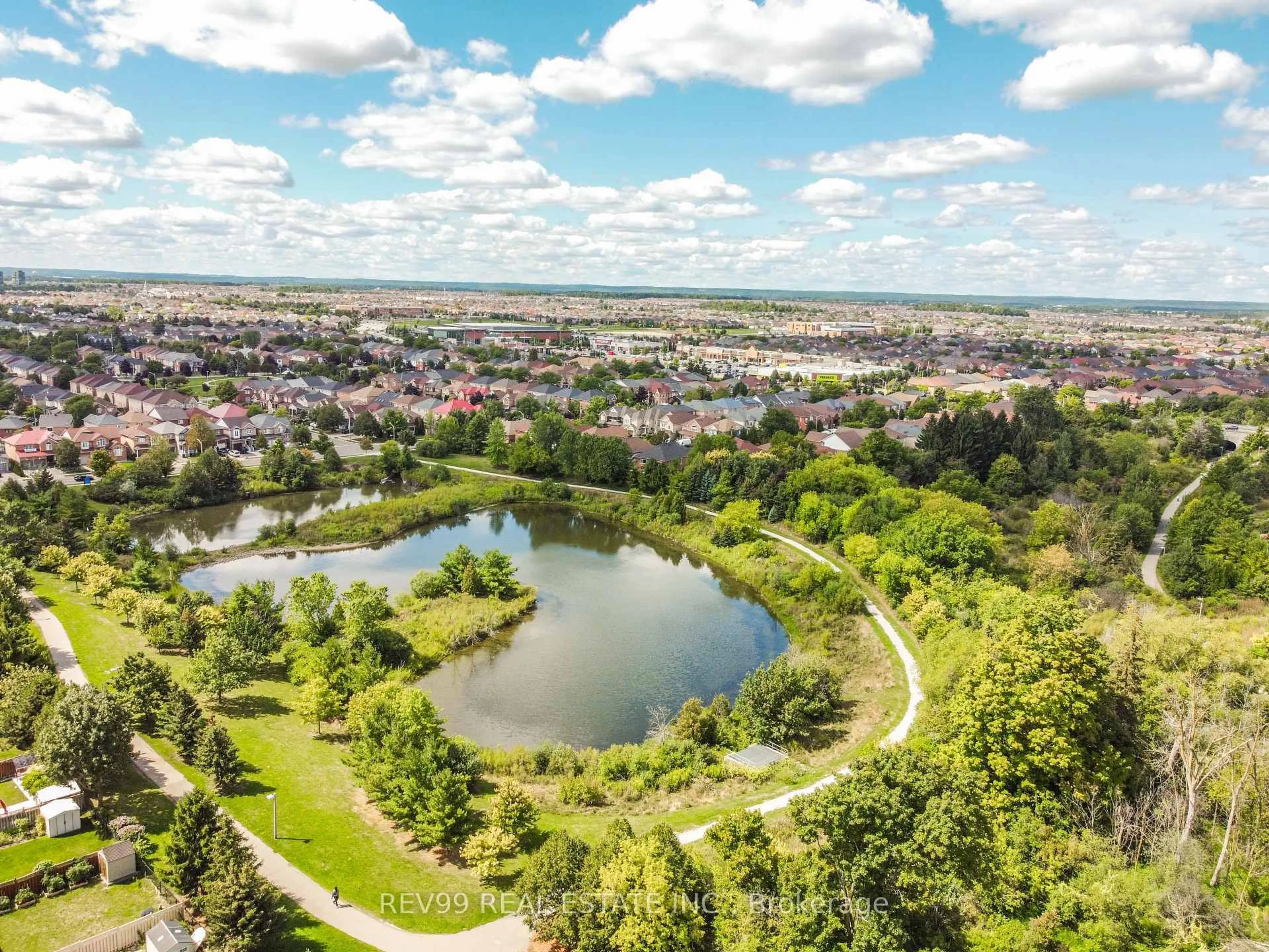A pic from outside/outdoor area/front of a property/back of a property/a pic from drone, water/lake/river/ocean view for 39 Bonistel Cres, Brampton Ontario L7A 3G8