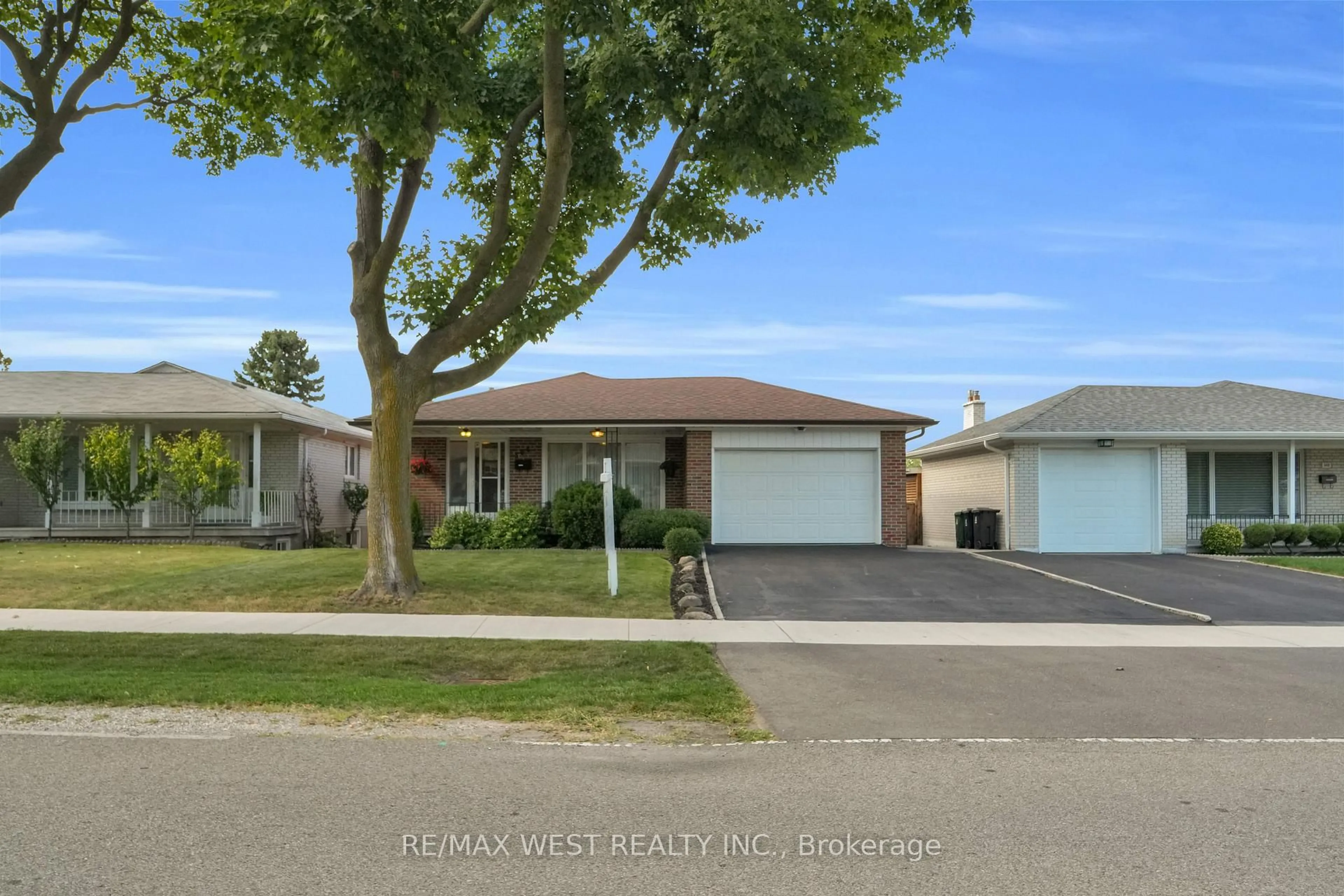 Home with vinyl exterior material, street for 304 La Rose Ave, Toronto Ontario M9P 1B9