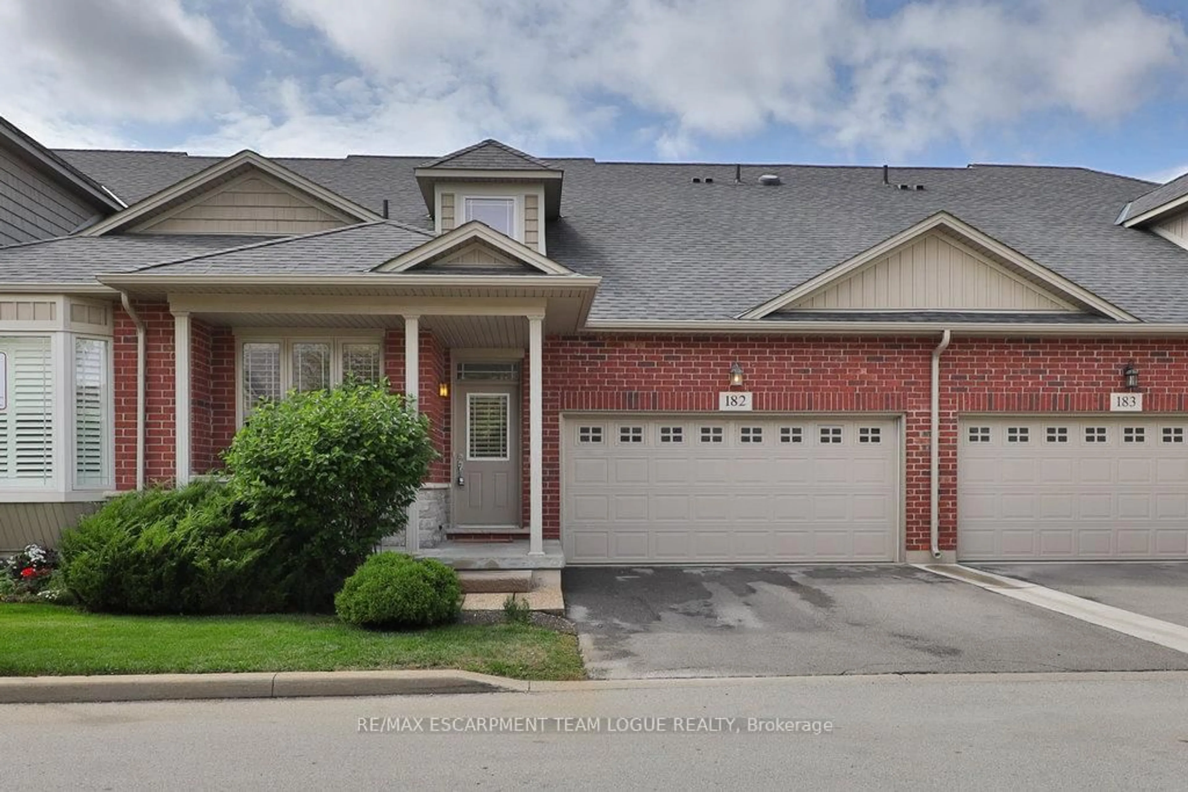 Home with brick exterior material, street for 2120 Itabashi Way #182, Burlington Ontario L7M 0V3
