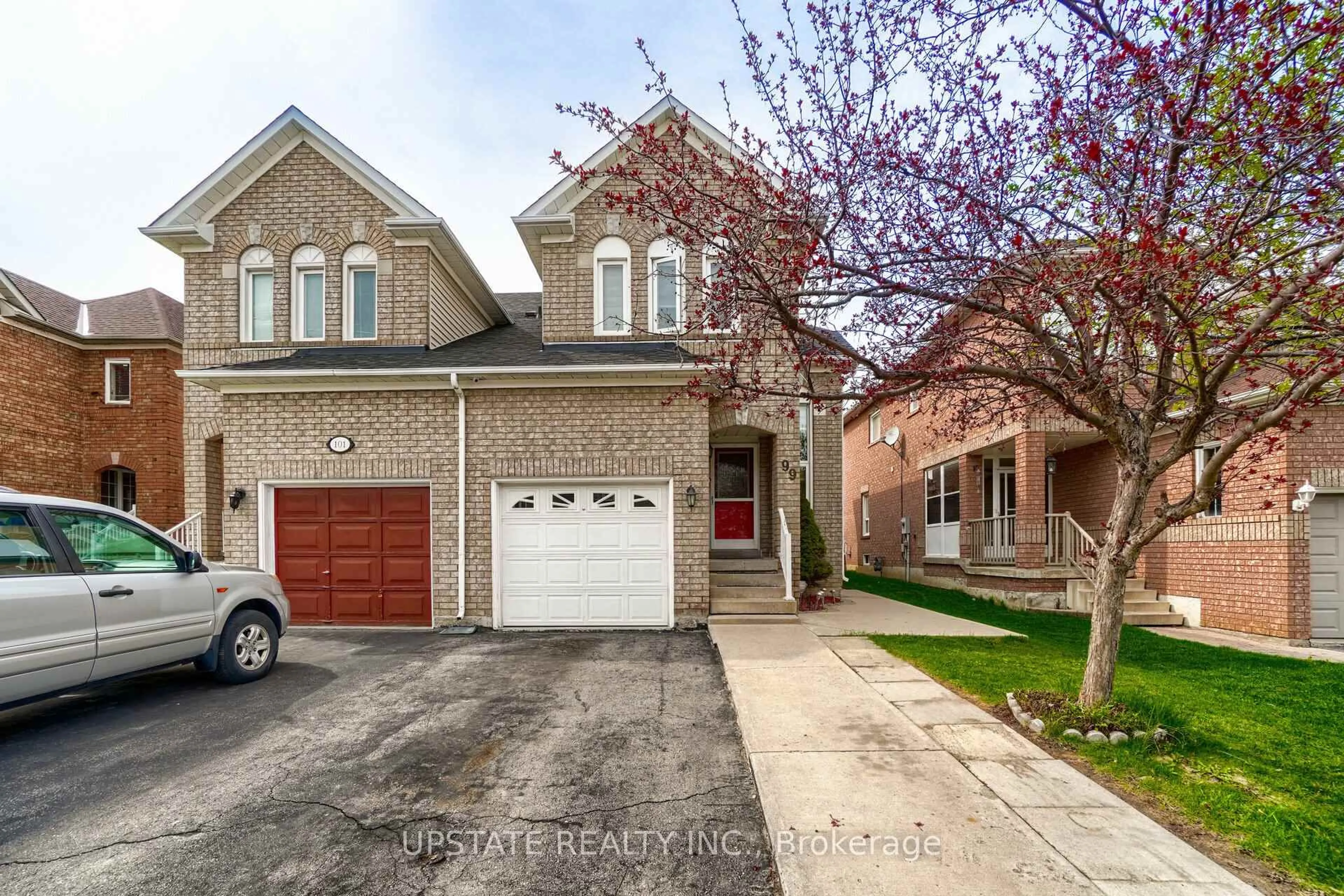 Home with brick exterior material, street for 99 Prairie Rose Circ, Brampton Ontario L6R 1R7