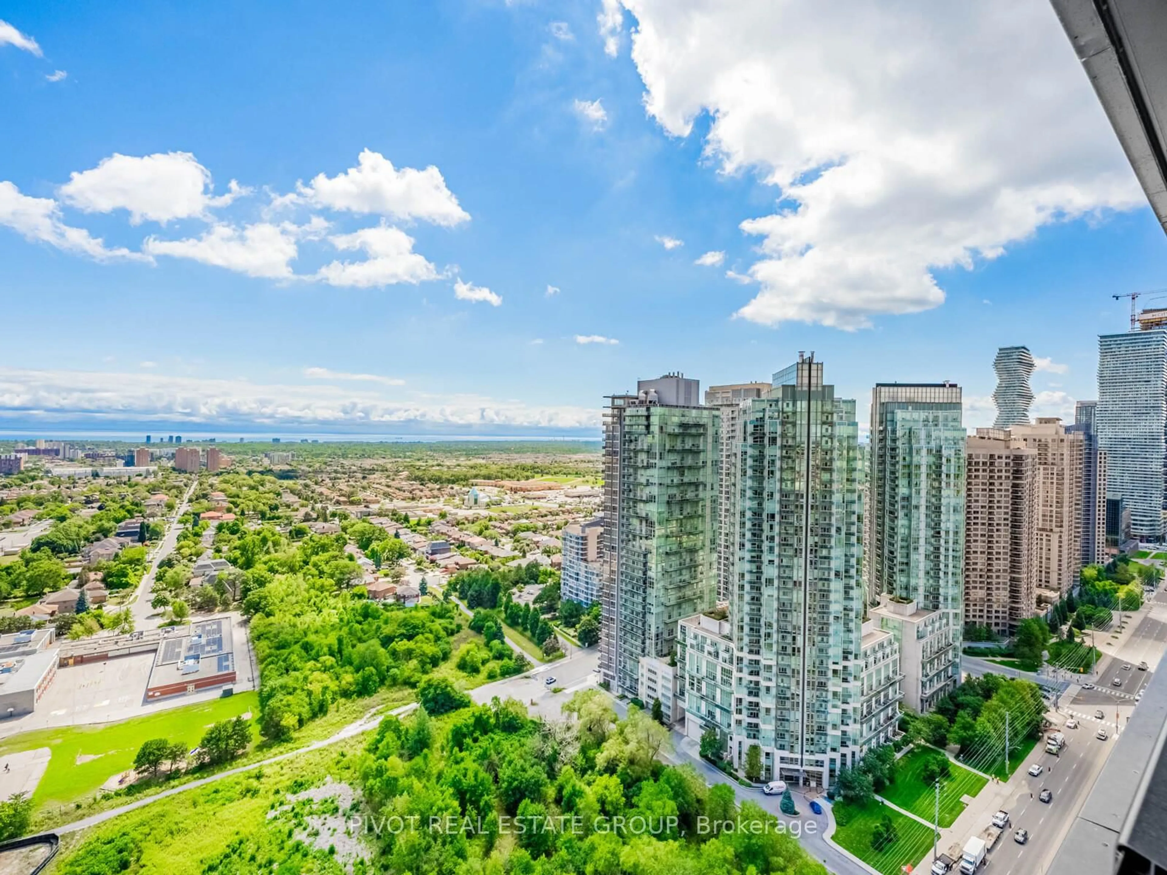 A pic from outside/outdoor area/front of a property/back of a property/a pic from drone, city buildings view from balcony for 135 City Centre Dr #UPH01, Mississauga Ontario L5B 1M7