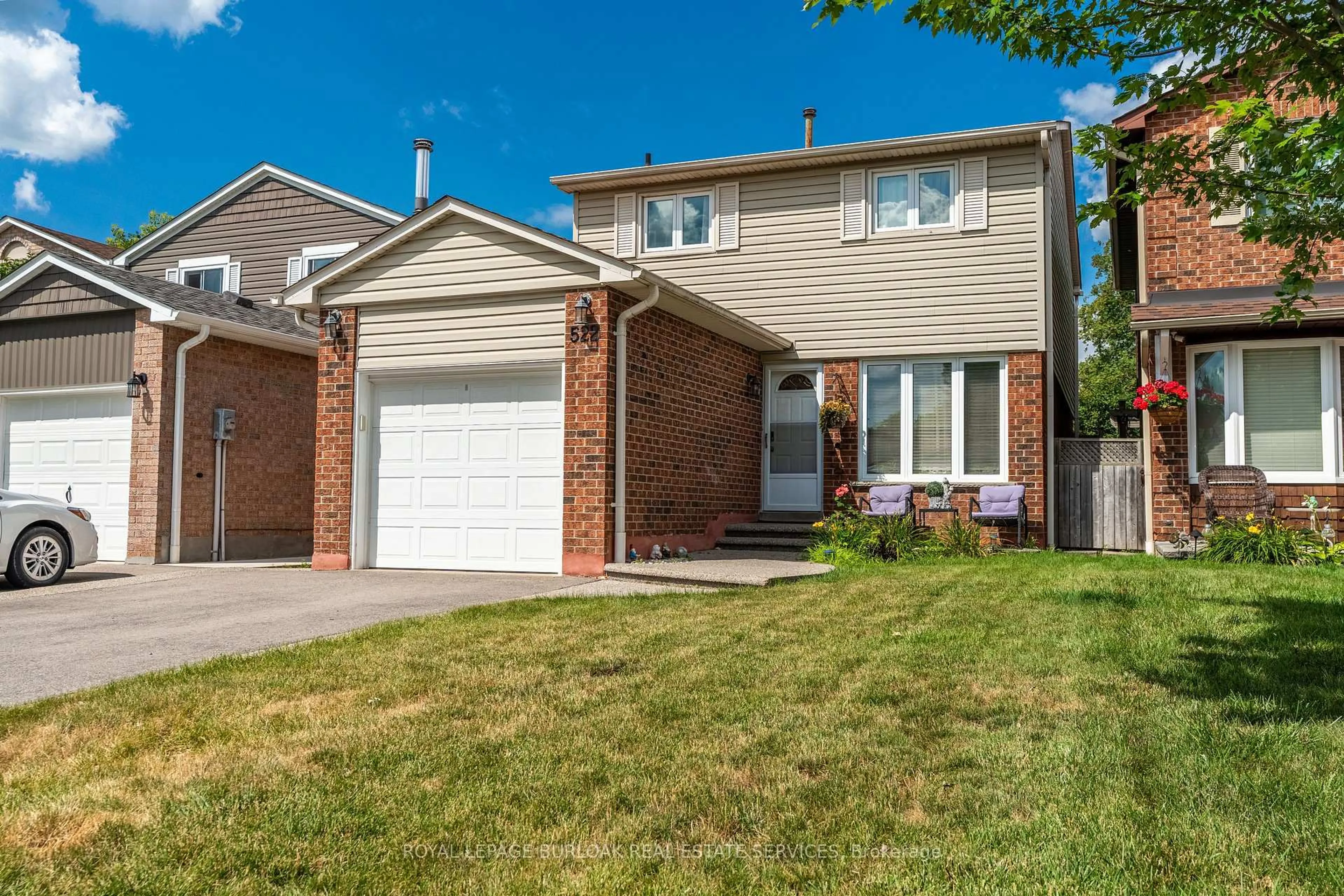 Home with brick exterior material, street for 522 Roseheath Dr, Milton Ontario L9T 4V6