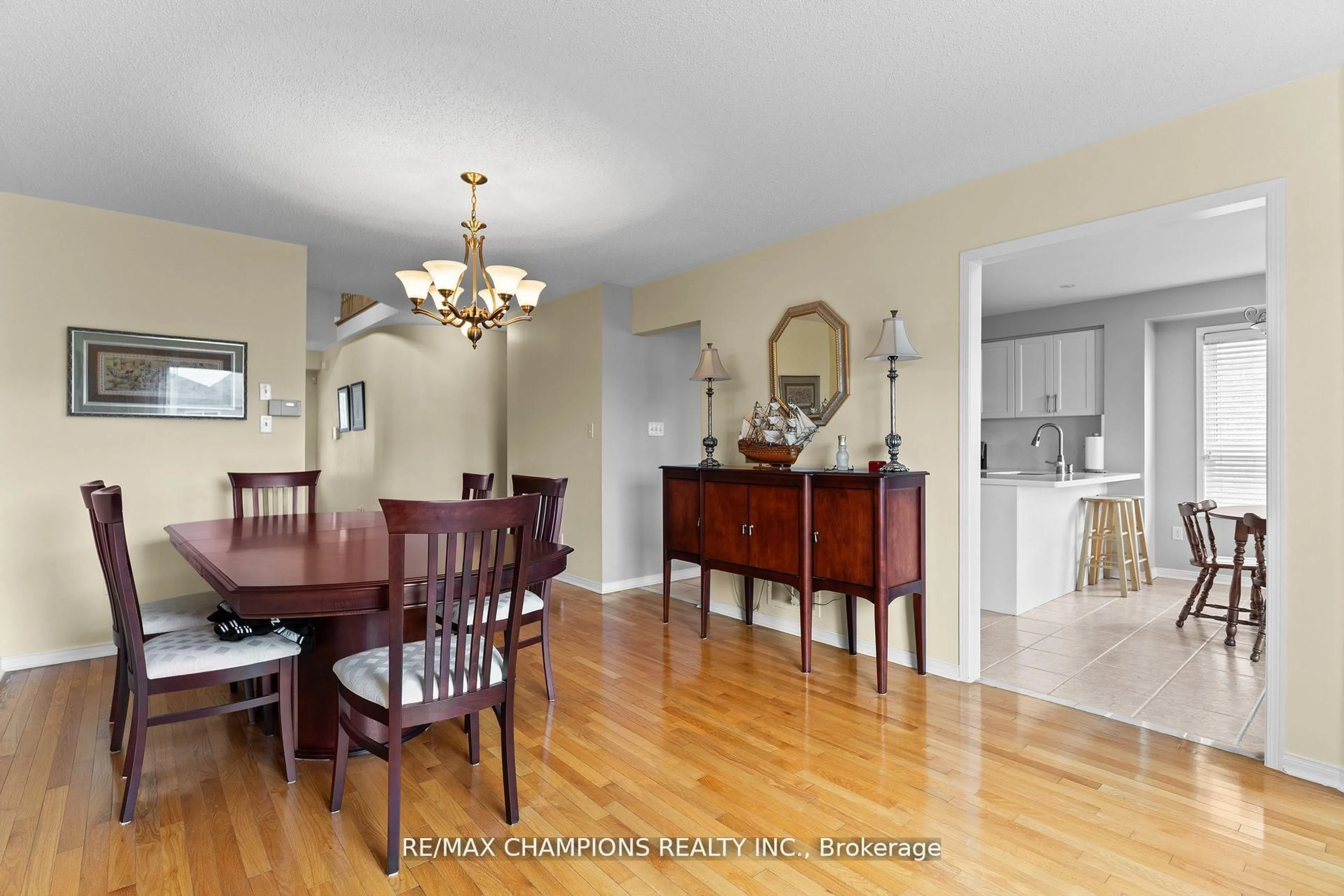Dining room, wood/laminate floor for 173 Sunny Meadow Blvd, Brampton Ontario L6R 2Z2
