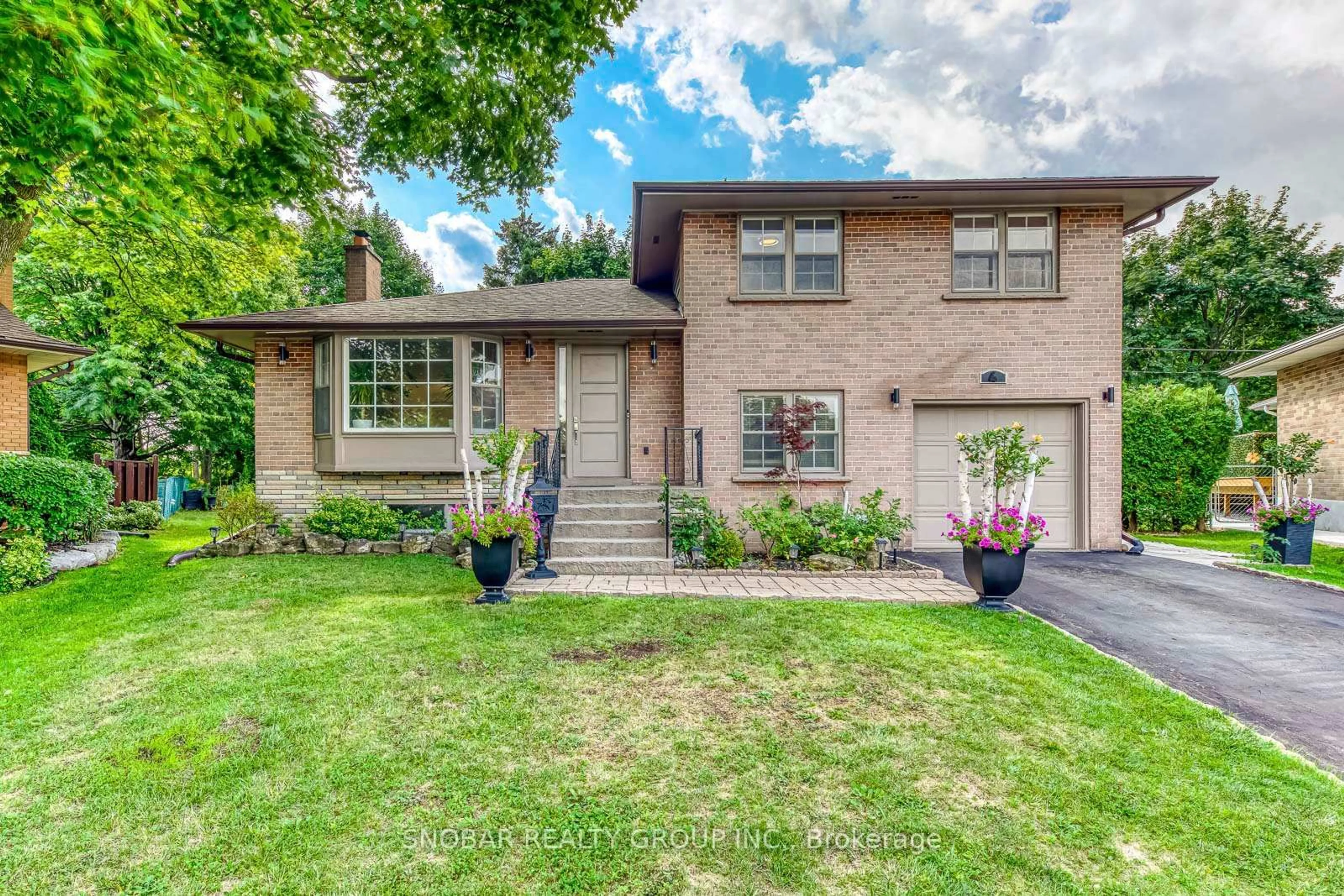 Home with brick exterior material, street for 4 Haregate Crt, Toronto Ontario M9R 3H5