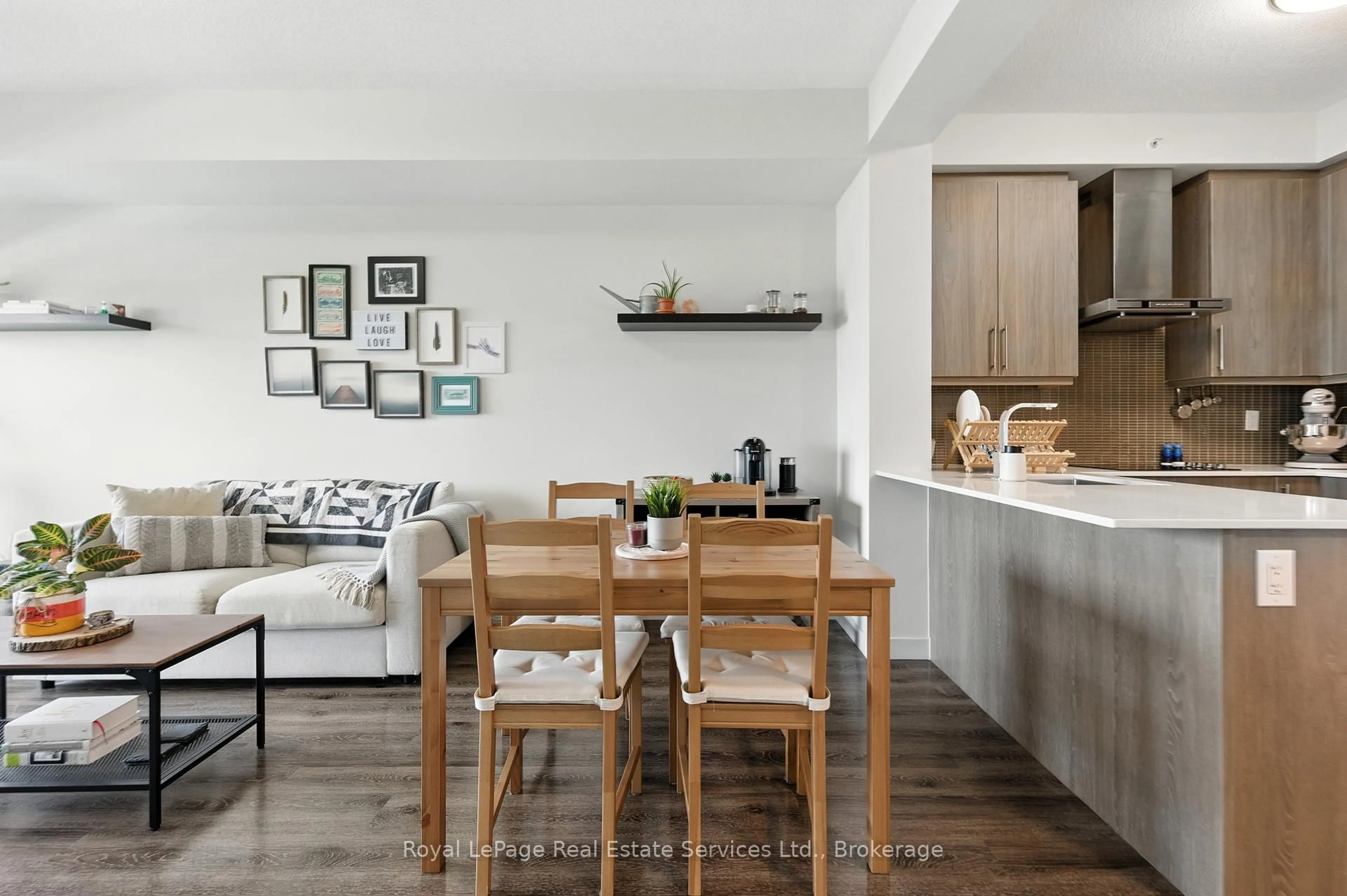 Open concept kitchen, wood/laminate floor for 2081 Fairview St #813, Burlington Ontario L7R 0E4