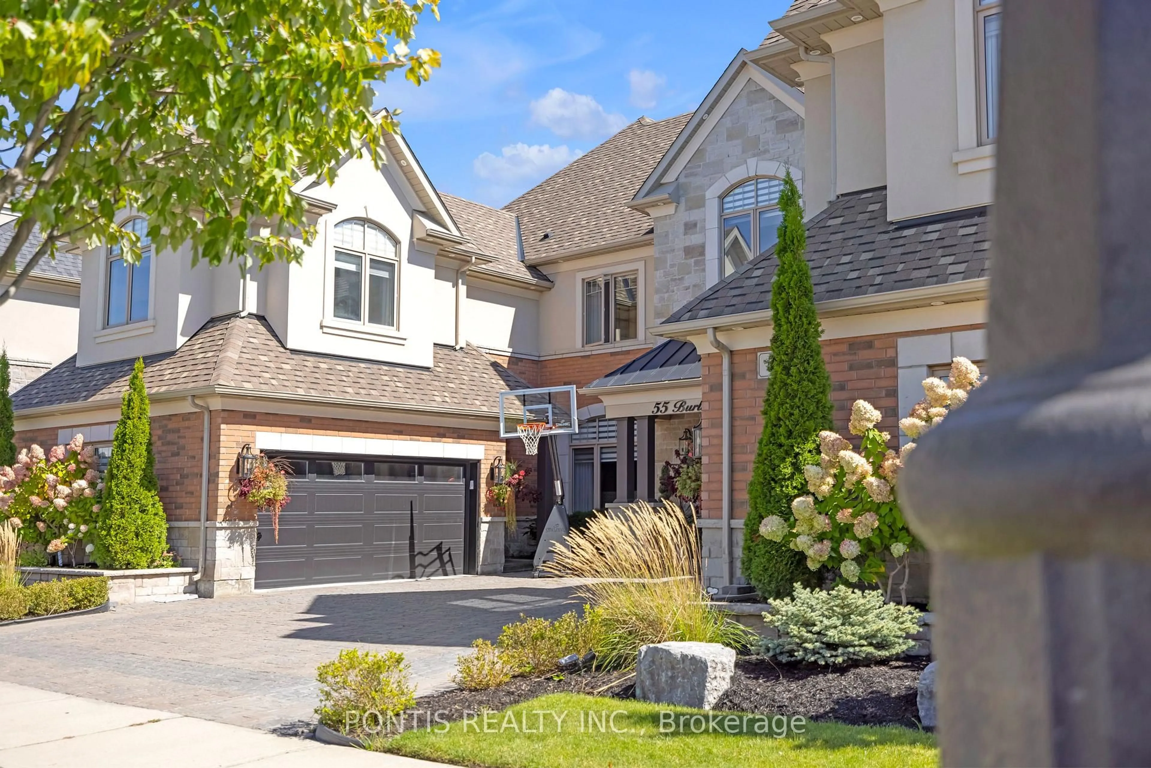 Home with brick exterior material, street for 55 Burlwood Rd, Brampton Ontario L6P 4E7