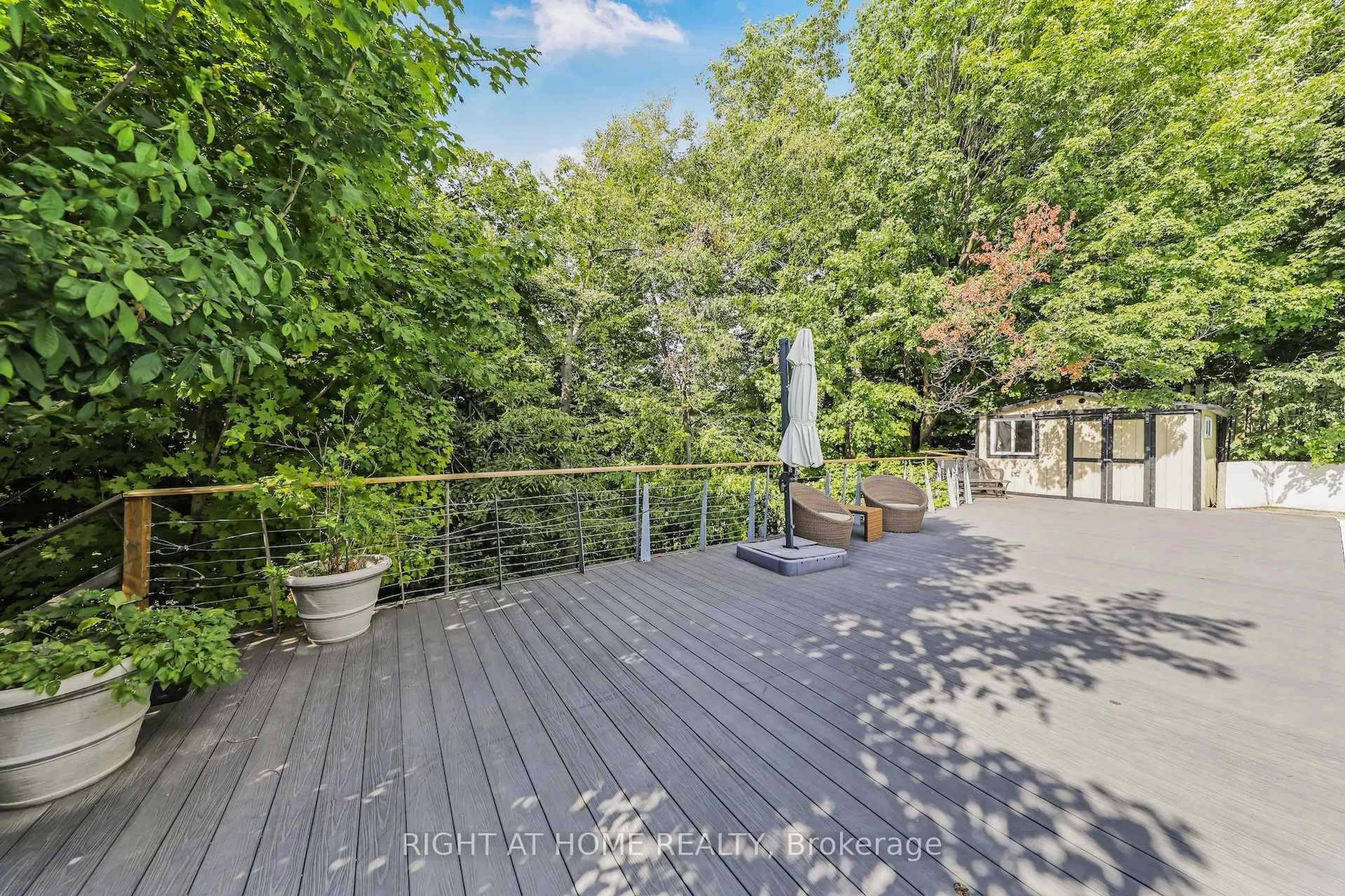 A pic from outside/outdoor area/front of a property/back of a property/a pic from drone, water/lake/river/ocean view for 8 Hillavon Dr, Toronto Ontario M9B 2P5
