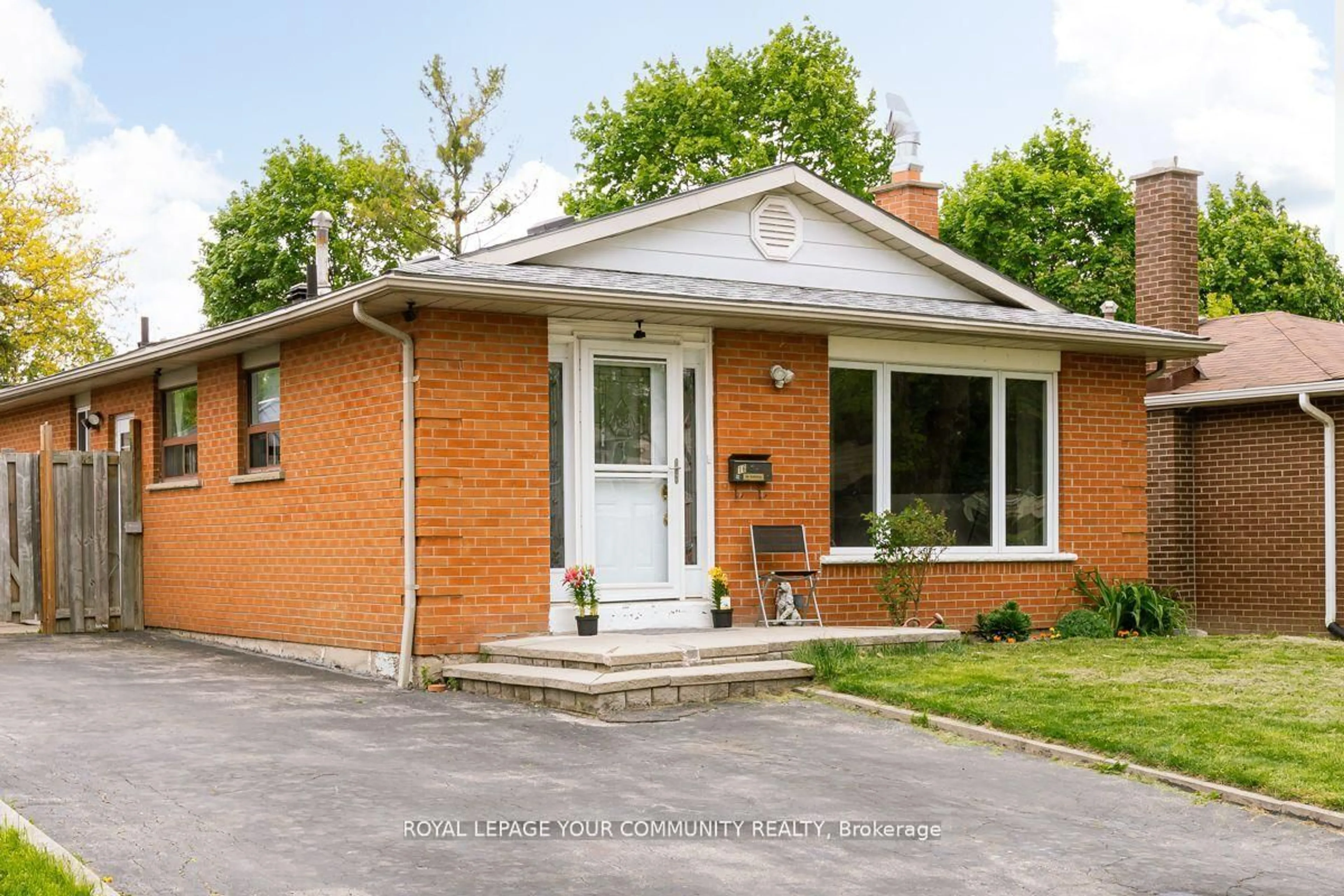 Home with brick exterior material, street for 16 Midhurst Dr, Toronto Ontario M9V 1Z7