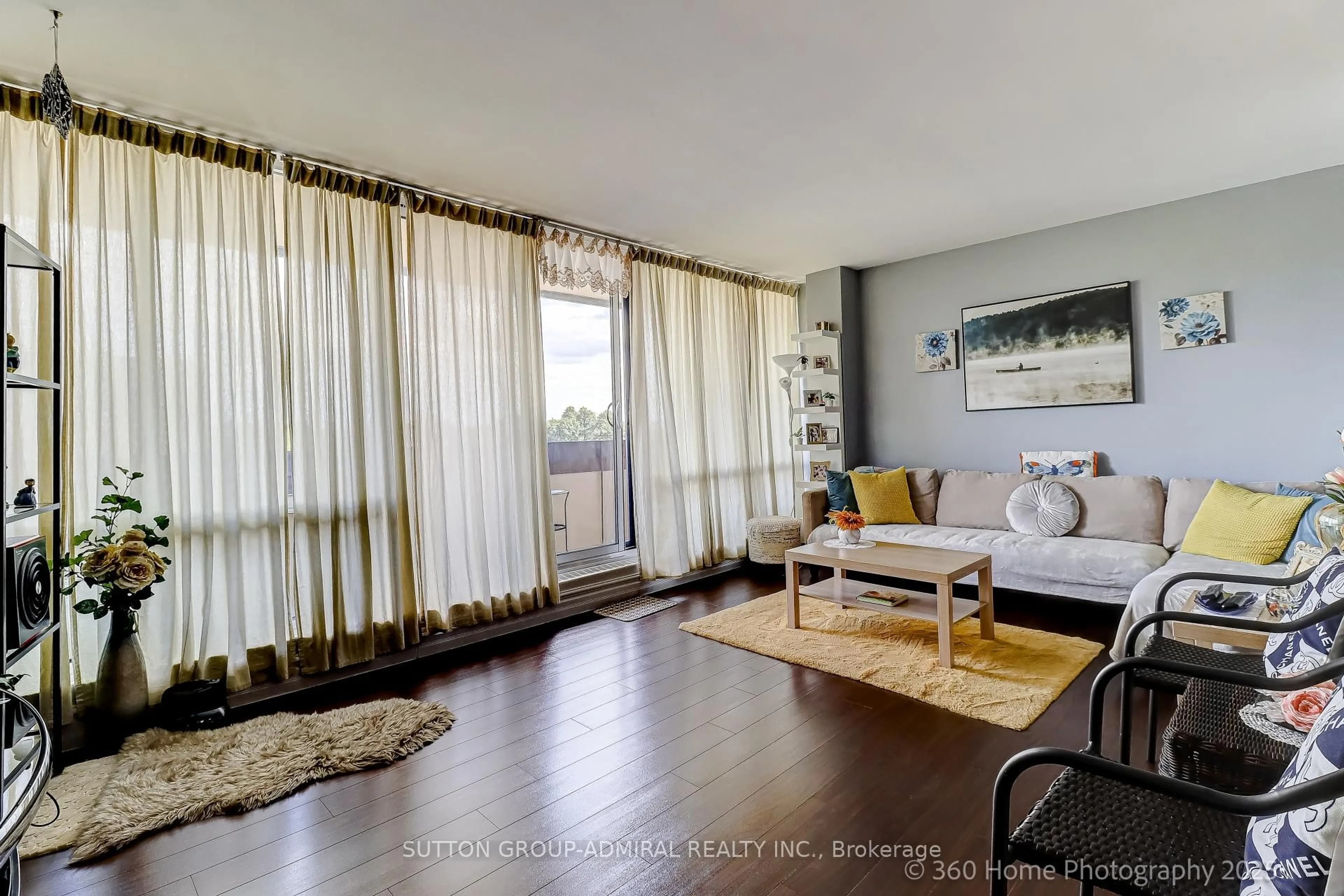 Living room with furniture, wood/laminate floor for 455 Sentinel Rd #711, Toronto Ontario M3J 1V5
