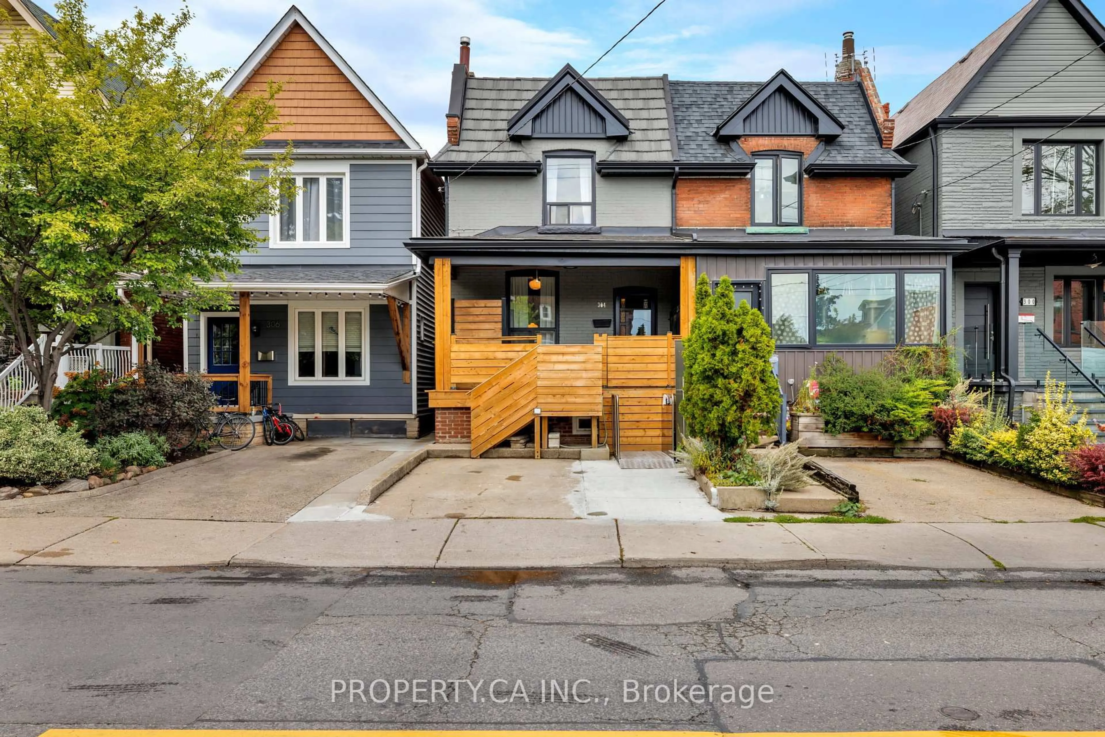 Home with brick exterior material, street for 304 Wallace Ave, Toronto Ontario M6P 3N4