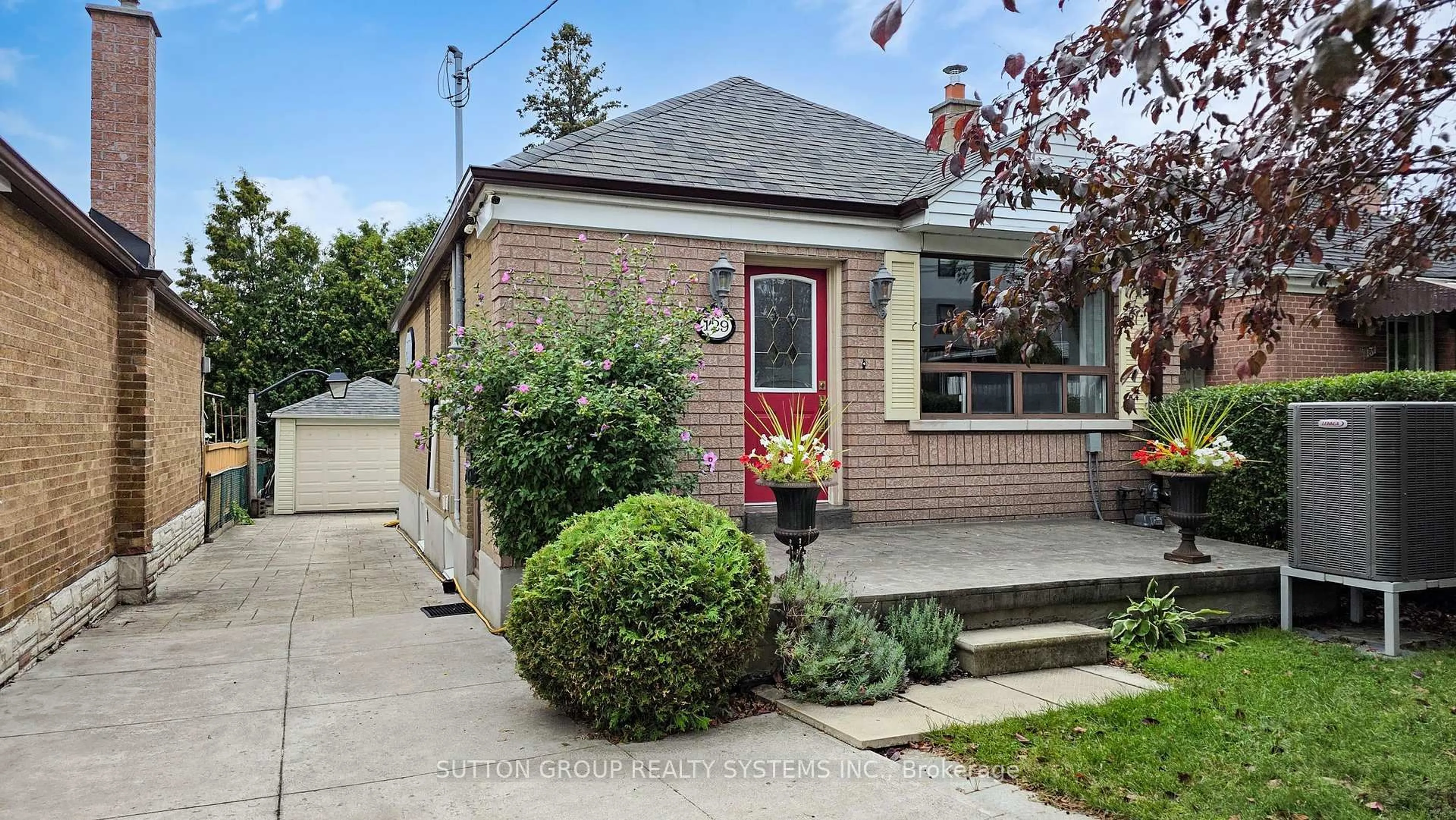 Home with brick exterior material, street for 129 Lonborough Ave, Toronto Ontario M6M 1X9