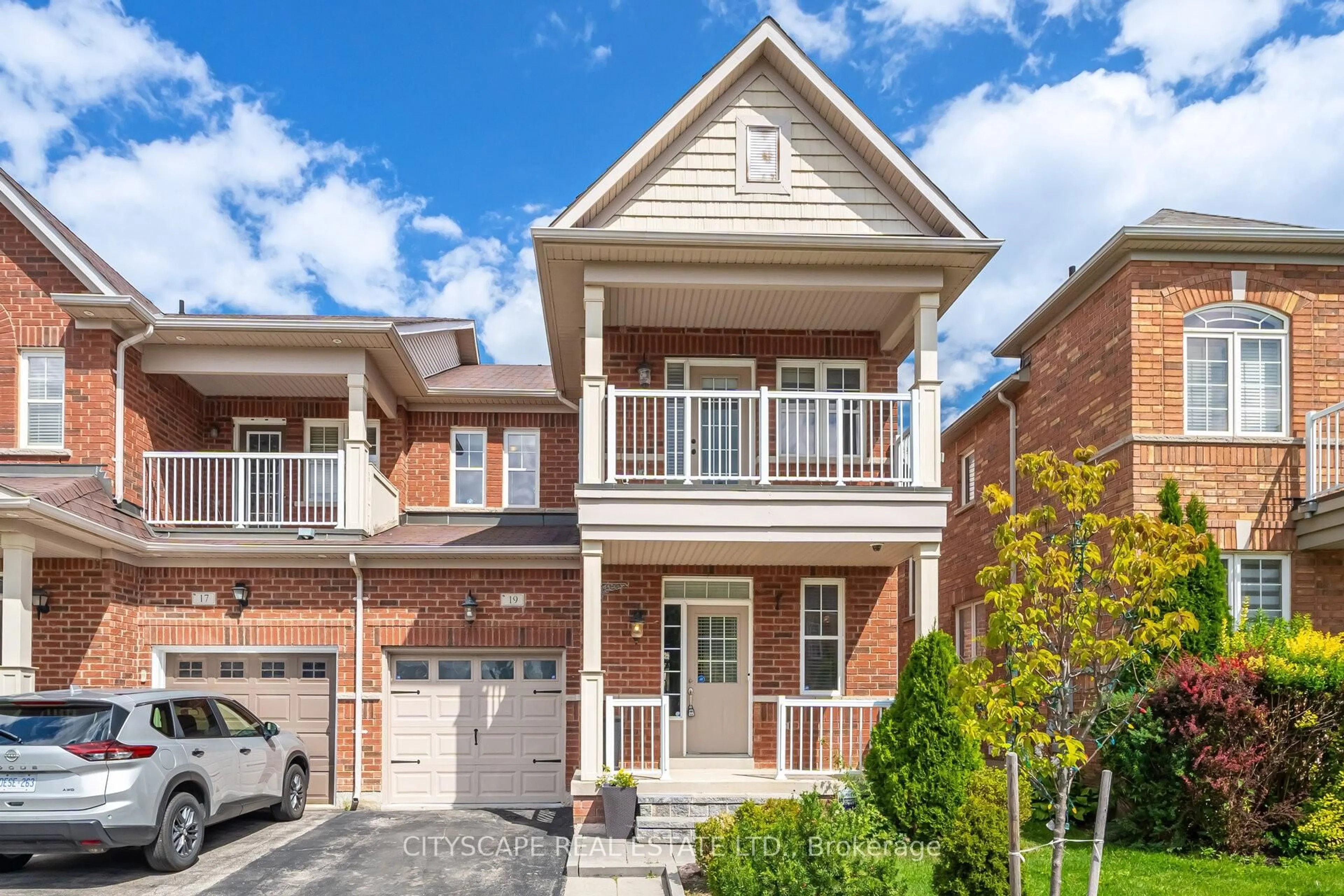 Home with brick exterior material, street for 19 Windflower Rd, Brampton Ontario L7A 0M1