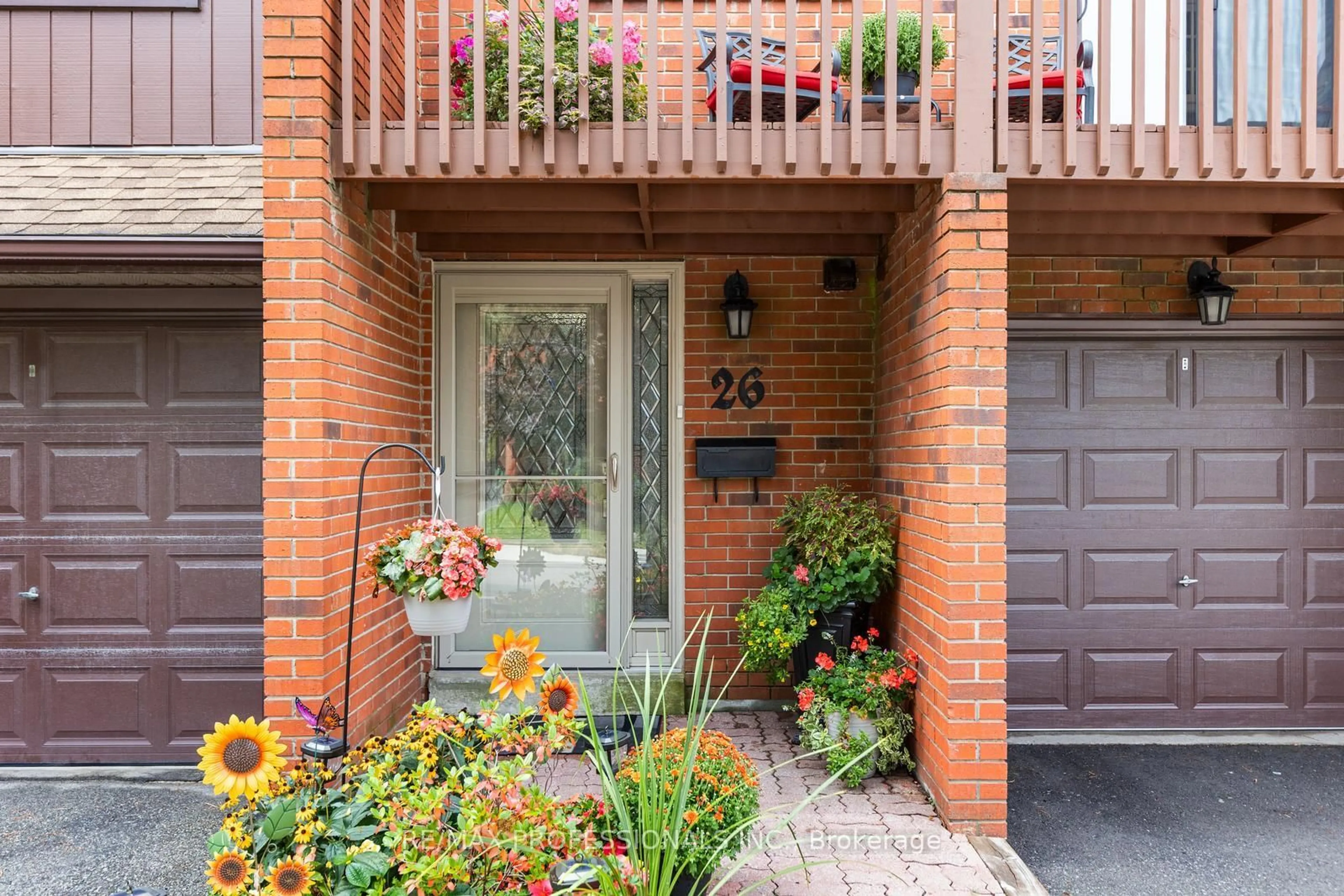 Home with brick exterior material, street for 4165 Fieldgate Dr #26, Mississauga Ontario L4W 2M9