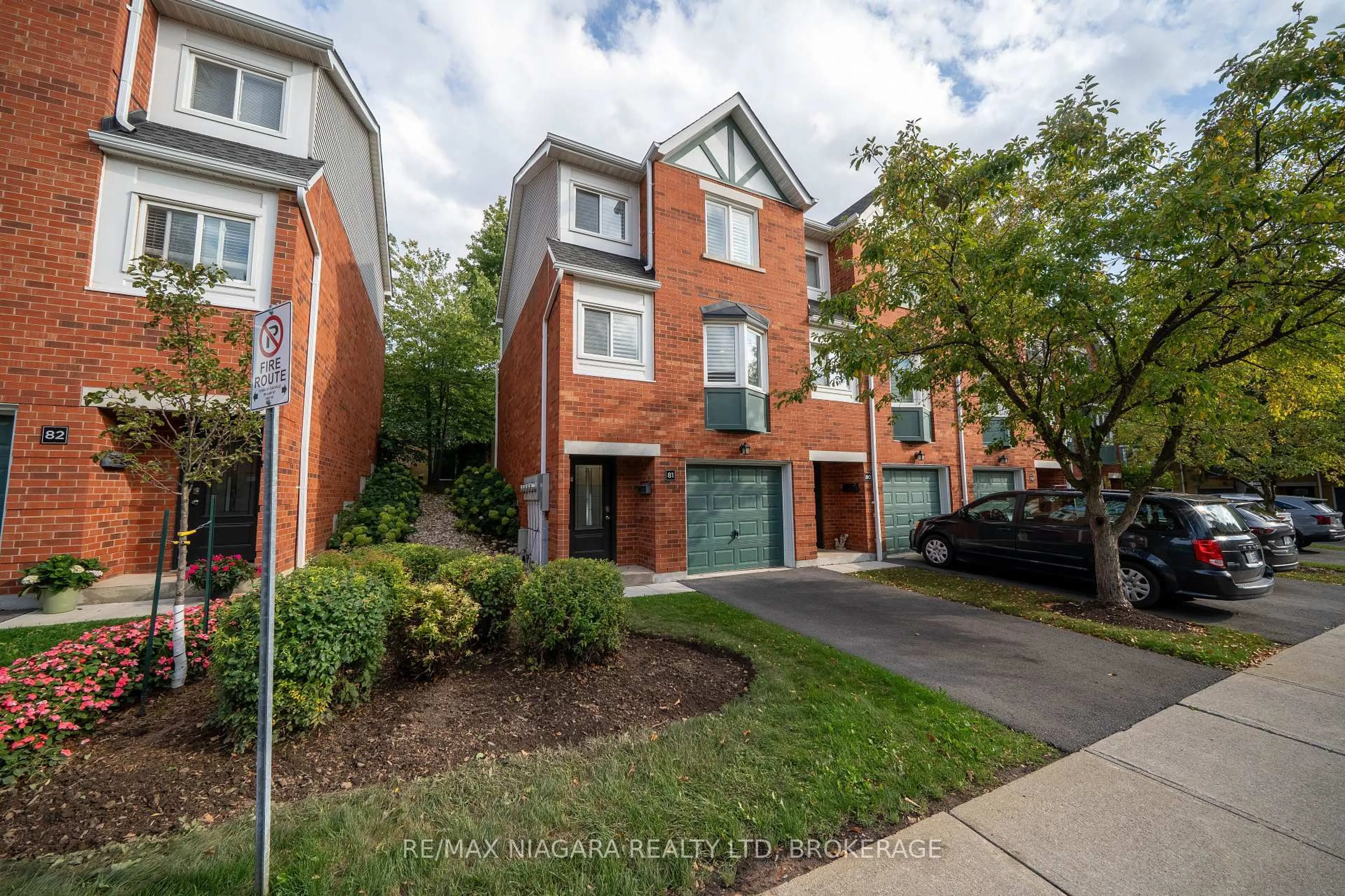 Home with brick exterior material, street for 2300 Brays Lane #81, Oakville Ontario L6M 3J9