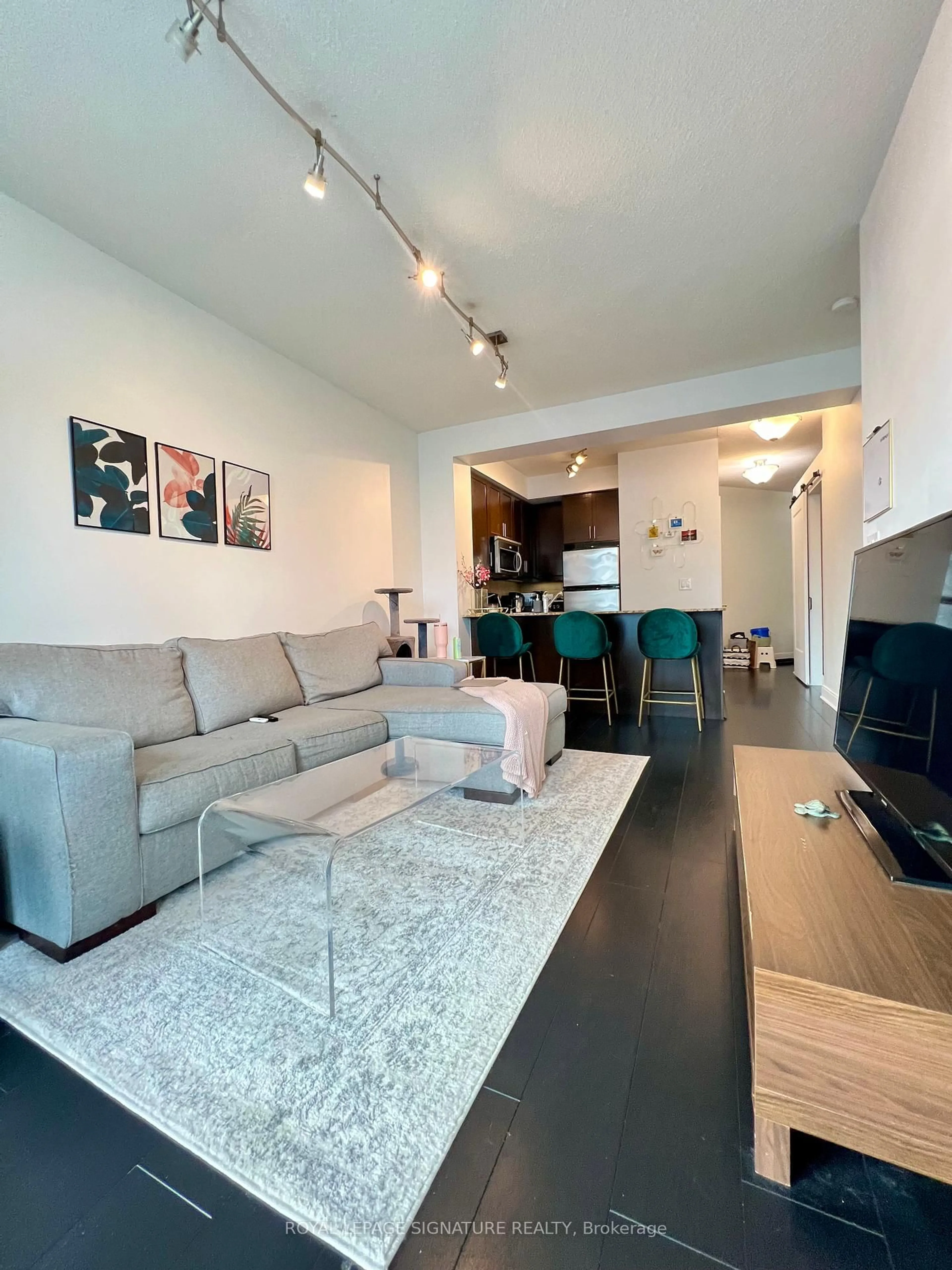 Living room with furniture, unknown for 80 Absolute Ave #607, Mississauga Ontario L4Z 0A5