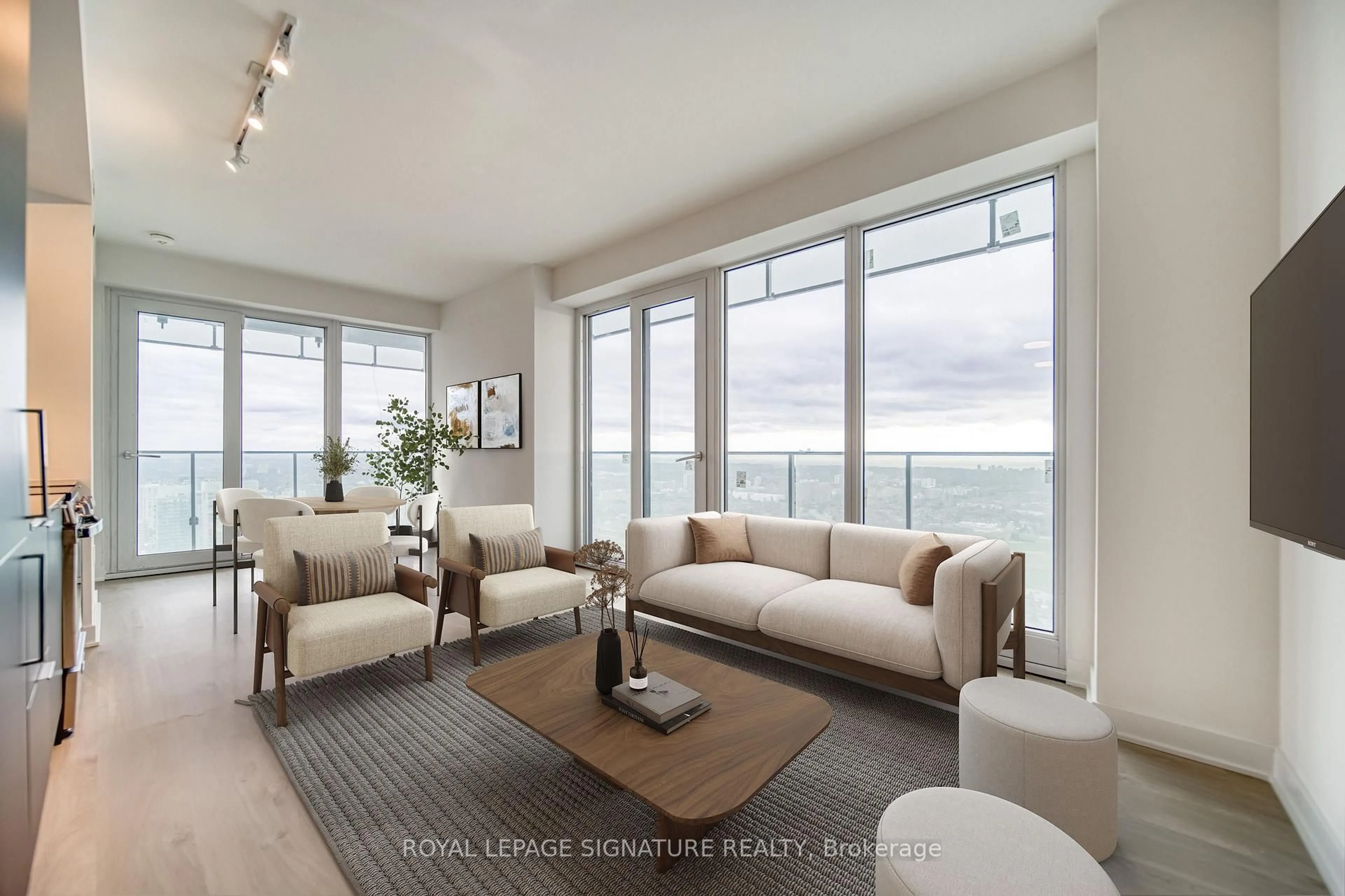 Living room with furniture, unknown for 3900 Confederation Pkwy #4503, Mississauga Ontario L5B 0M3