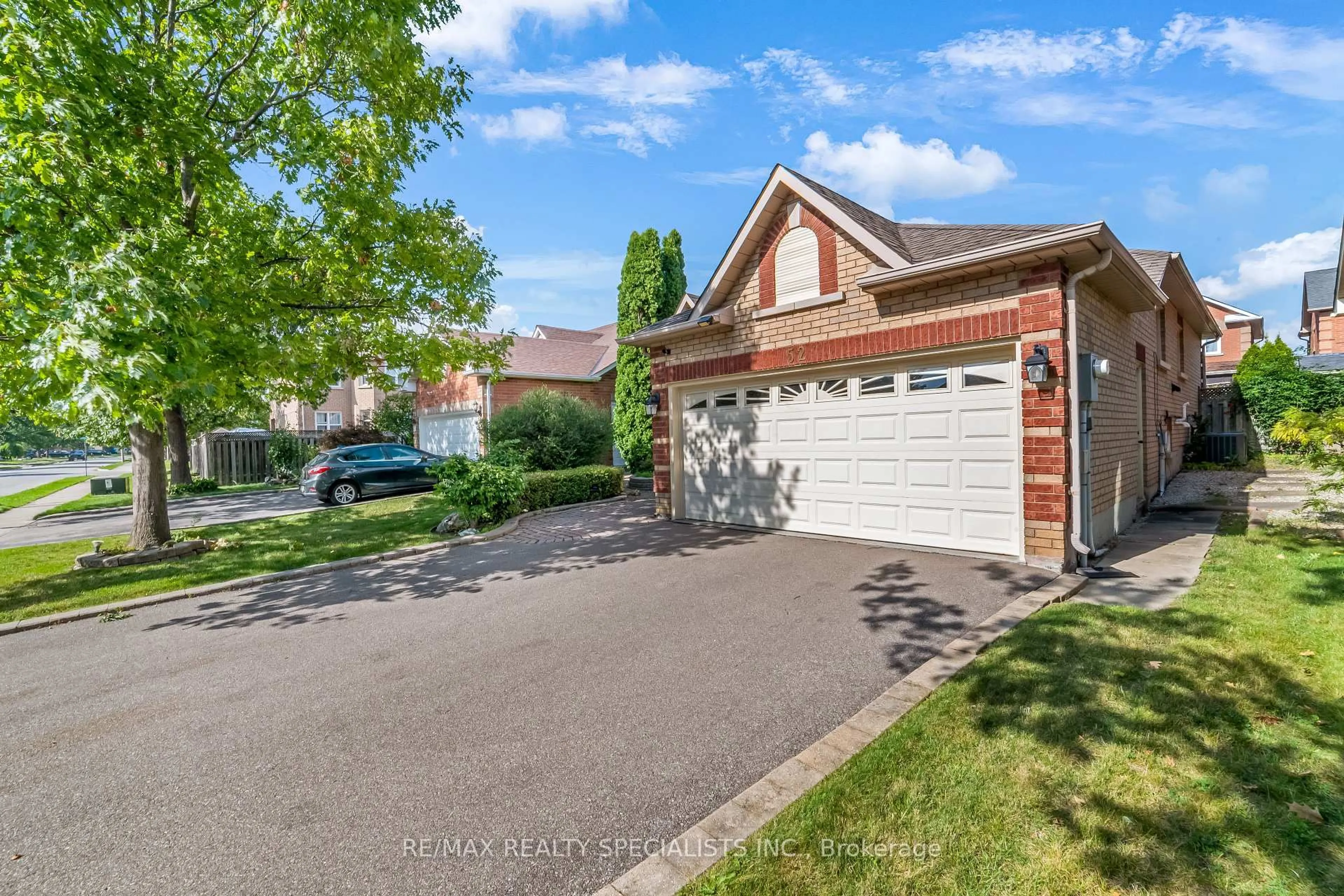 Home with brick exterior material, street for 52 Buffridge Tr, Brampton Ontario L7A 1H8