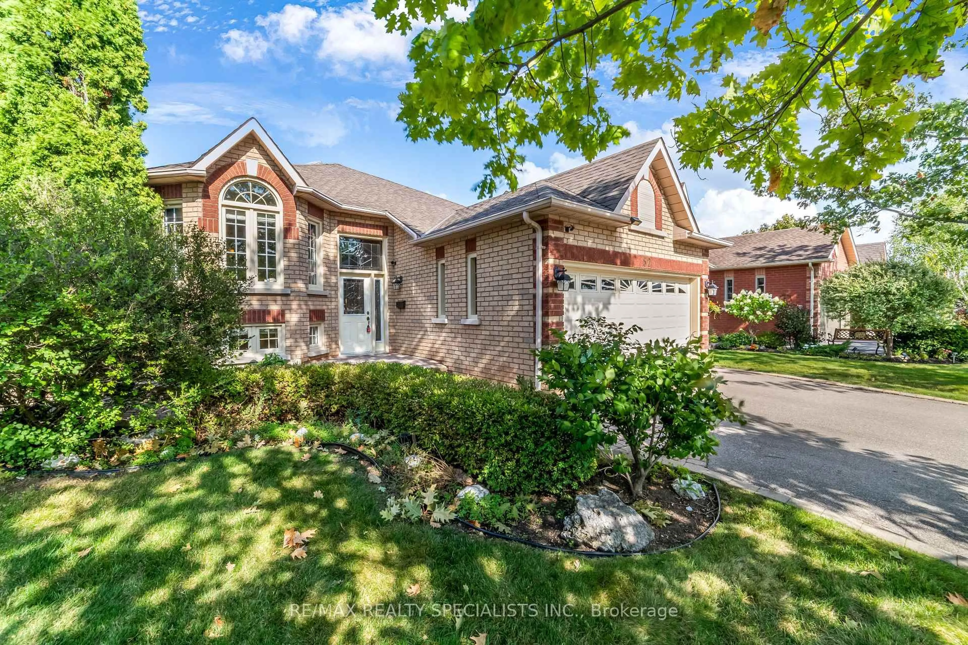 Home with brick exterior material, street for 52 Buffridge Tr, Brampton Ontario L7A 1H8