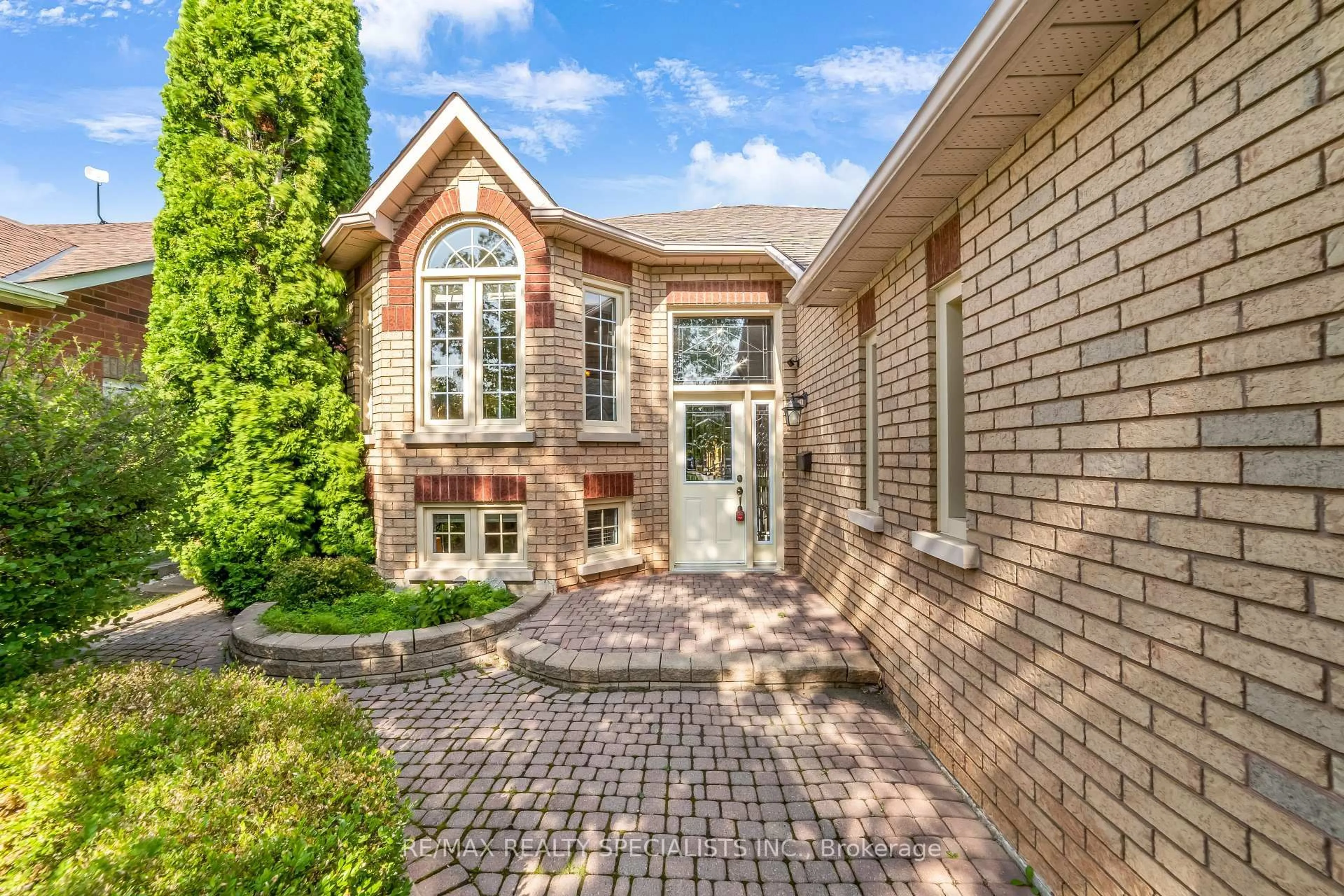Home with brick exterior material, street for 52 Buffridge Tr, Brampton Ontario L7A 1H8